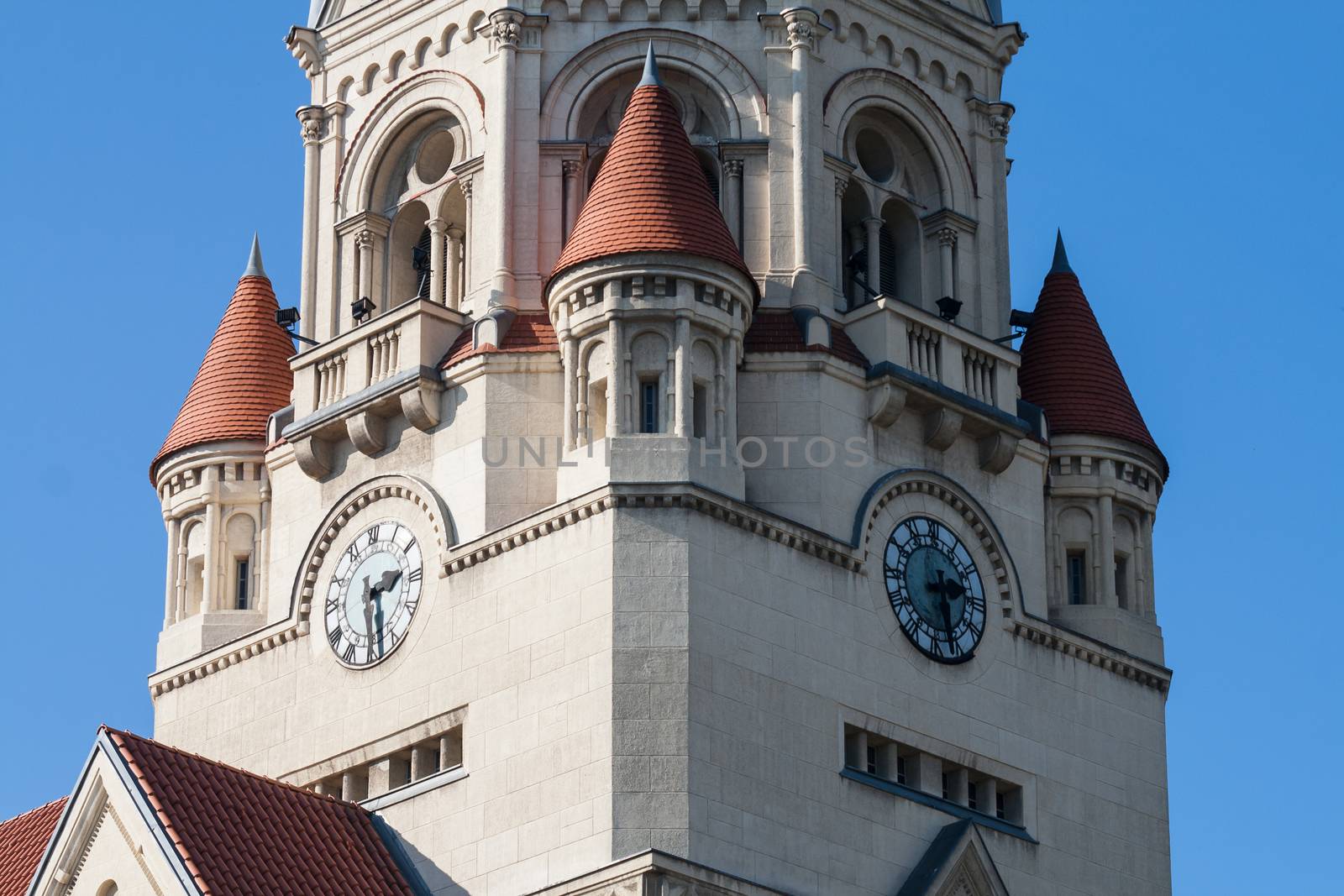 Church tower with a clock in city of Lodz, Poland by MichalLudwiczak