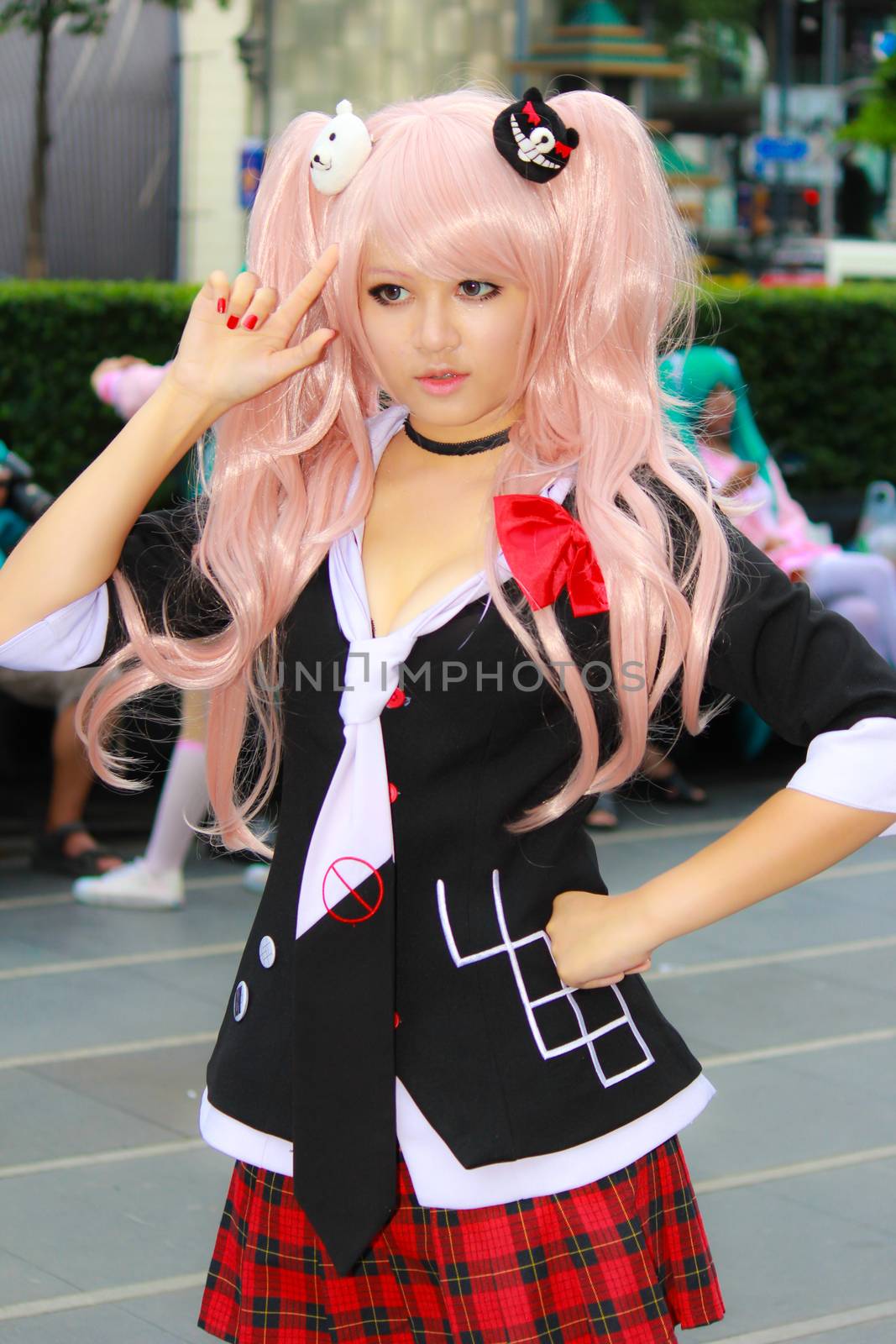 Bangkok - Aug 31: An unidentified Japanese anime cosplay pose  on August 31, 2014 at Central World, Bangkok, Thailand.