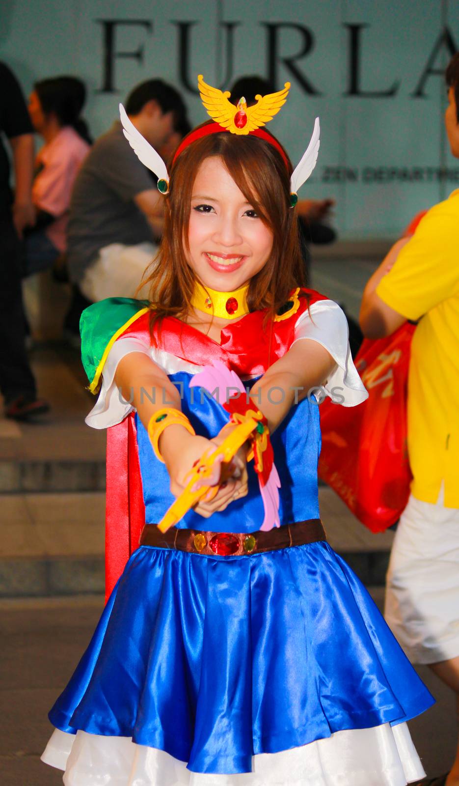 Bangkok - Aug 31: An unidentified Japanese anime cosplay pose  on August 31, 2014 at Central World, Bangkok, Thailand.