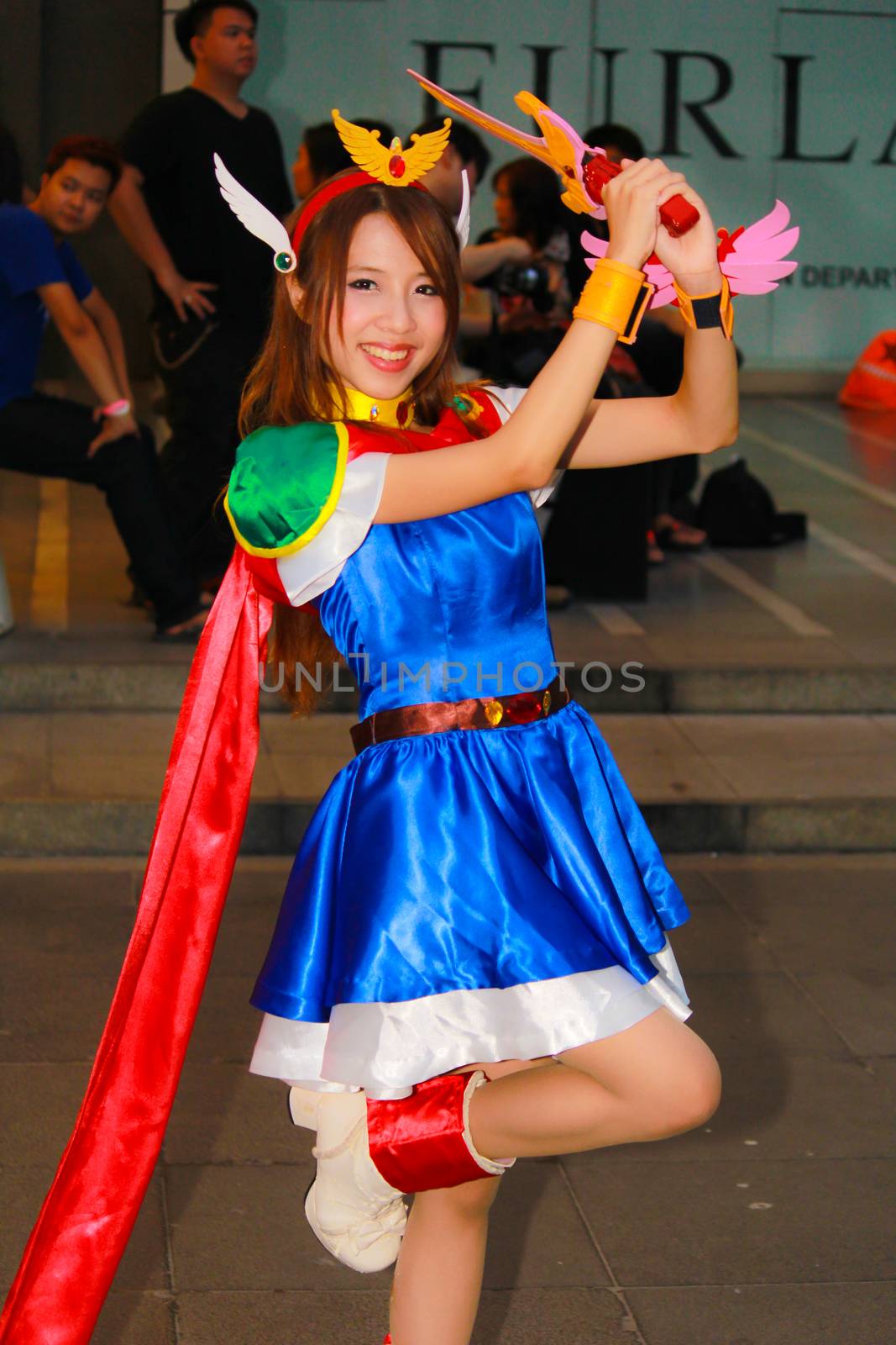 Bangkok - Aug 31: An unidentified Japanese anime cosplay pose  on August 31, 2014 at Central World, Bangkok, Thailand.