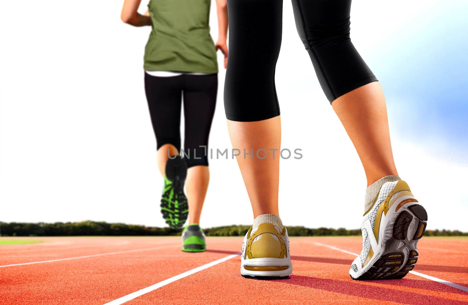 Women Running on Tracks