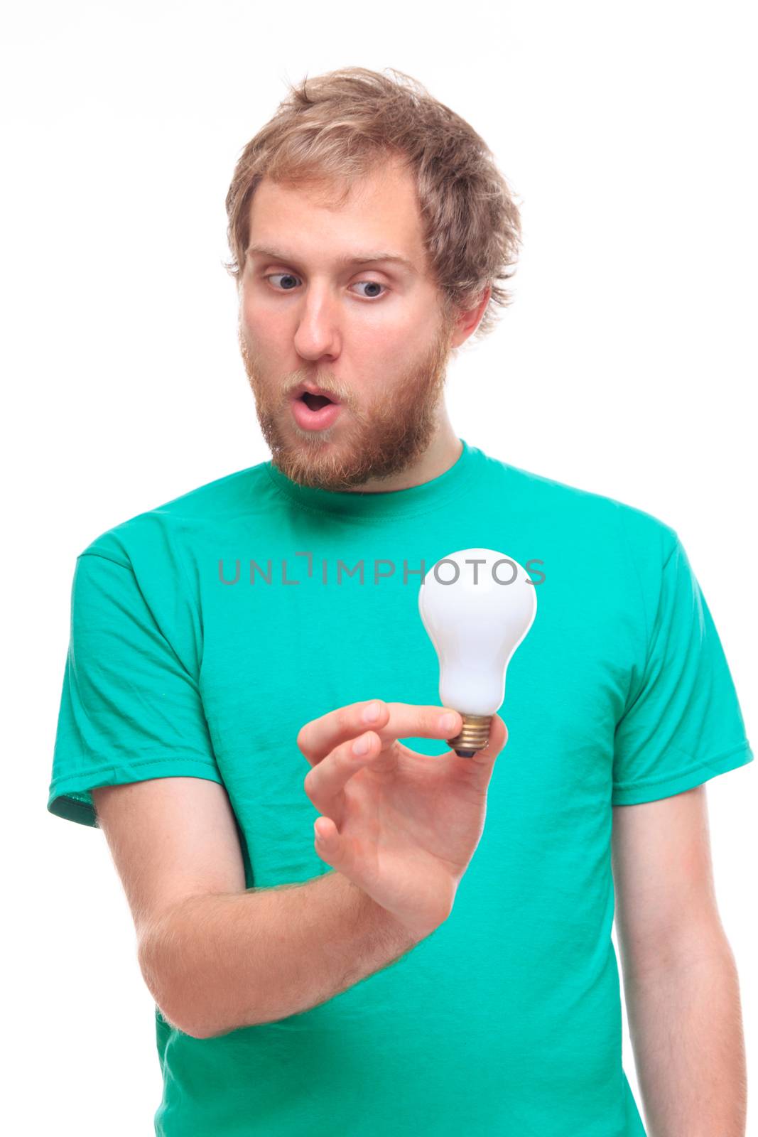 Surprised man holding a bulb - studio shoot 