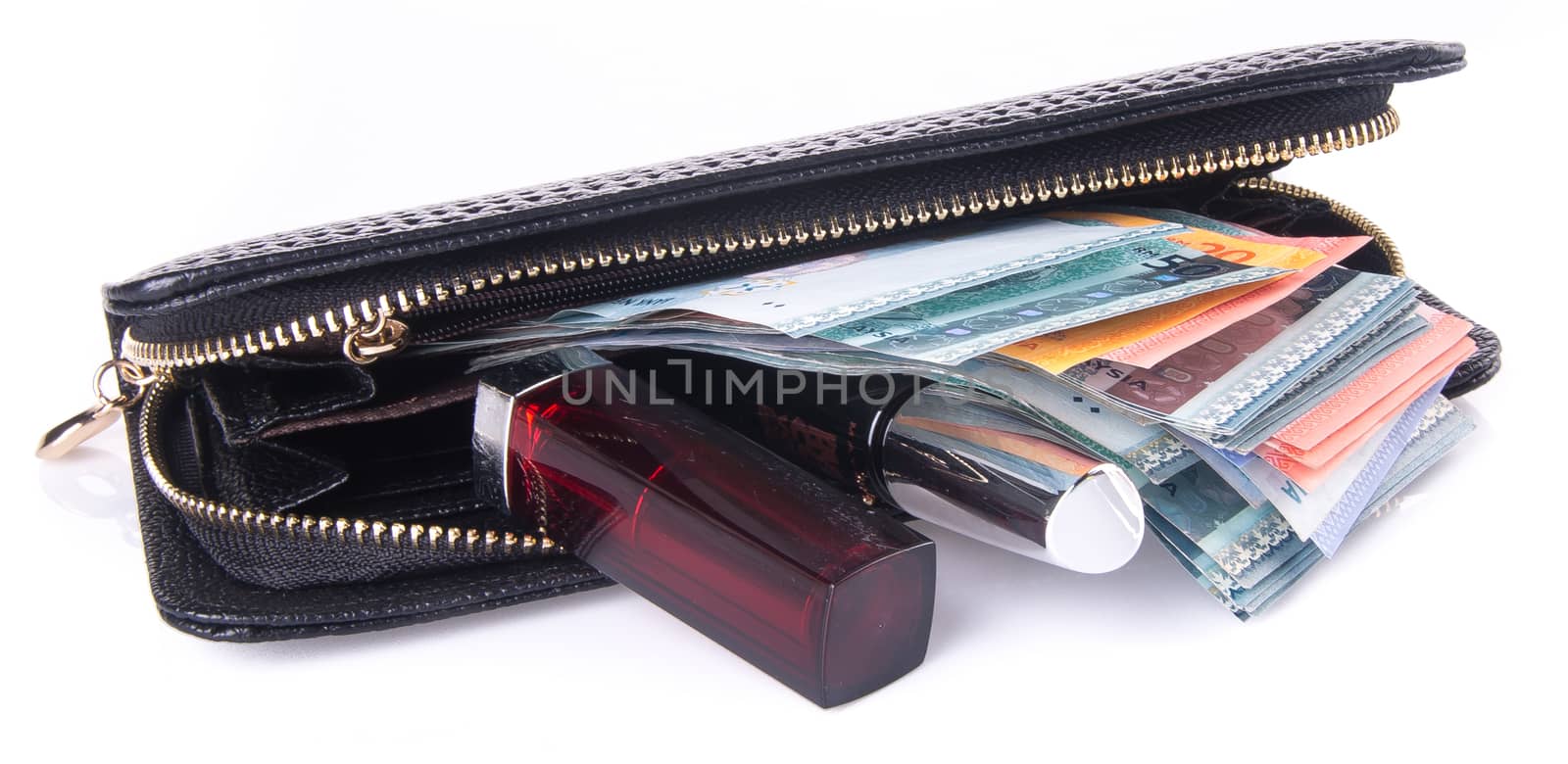 wallet. woman wallet with money on background