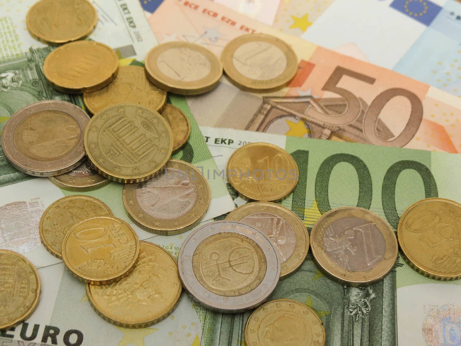 Euro banknotes and coins by paolo77