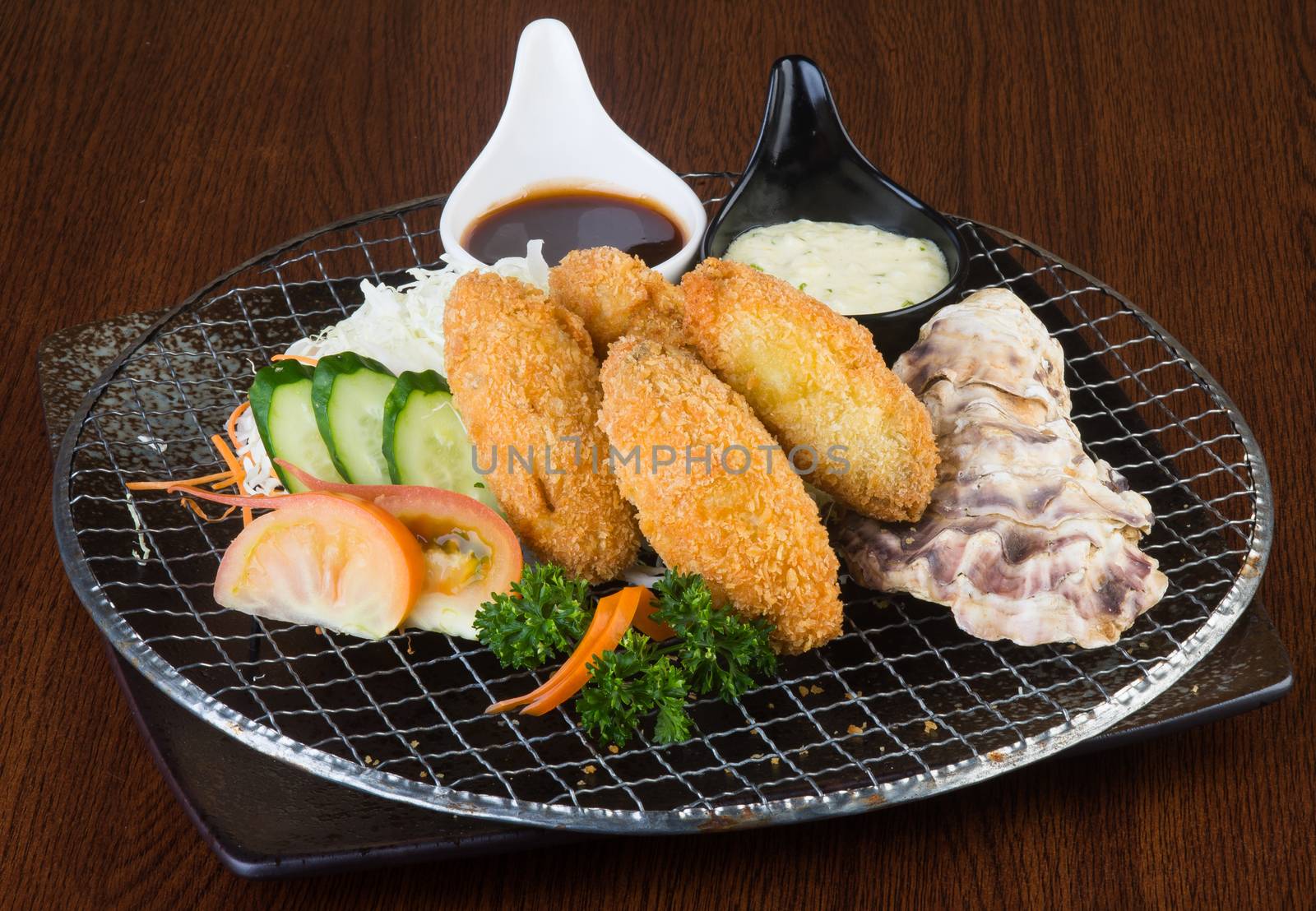 japanese cuisine. tempura seafood on the background