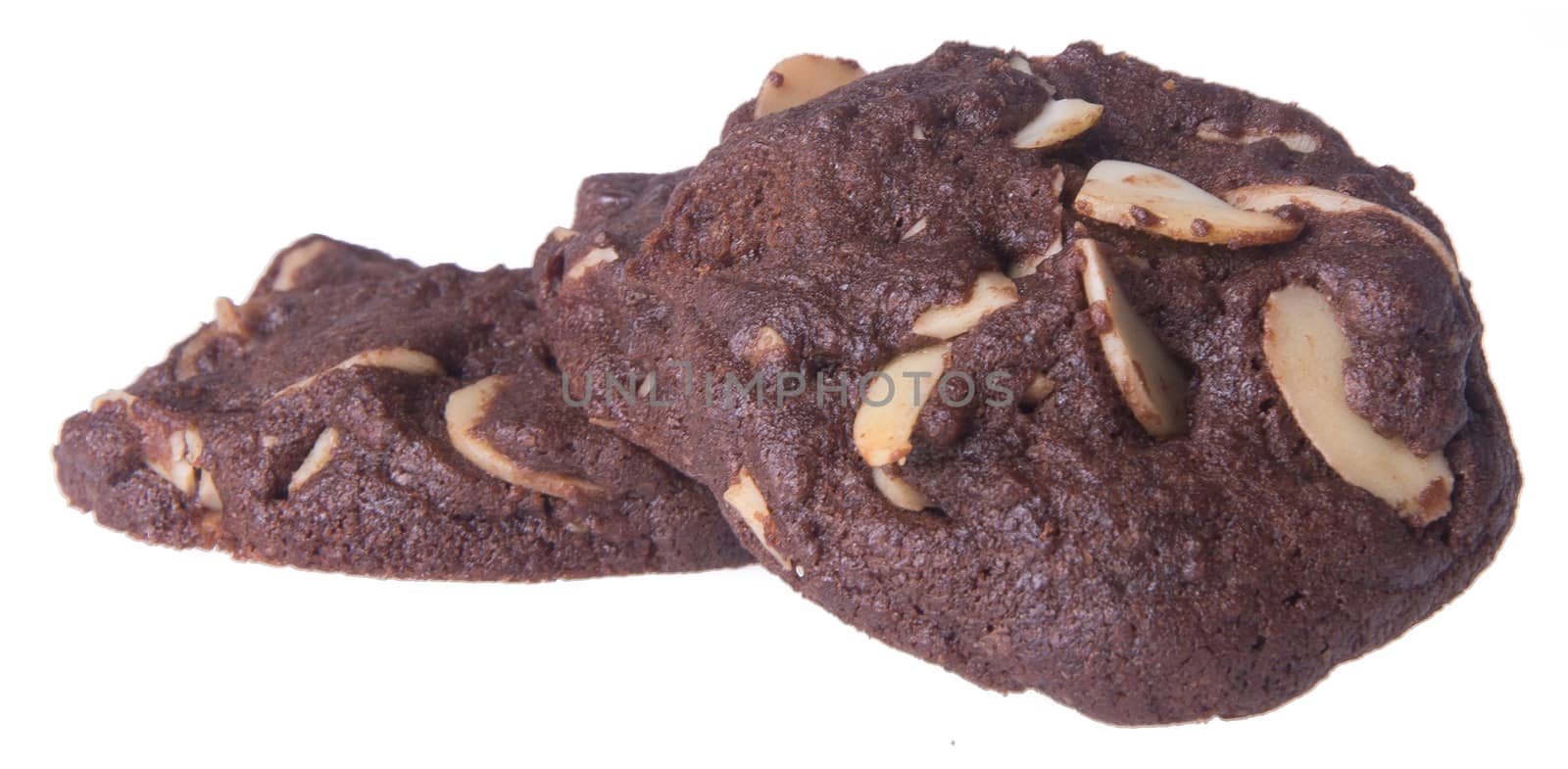 Almonds chocolate chips cookies on background by heinteh