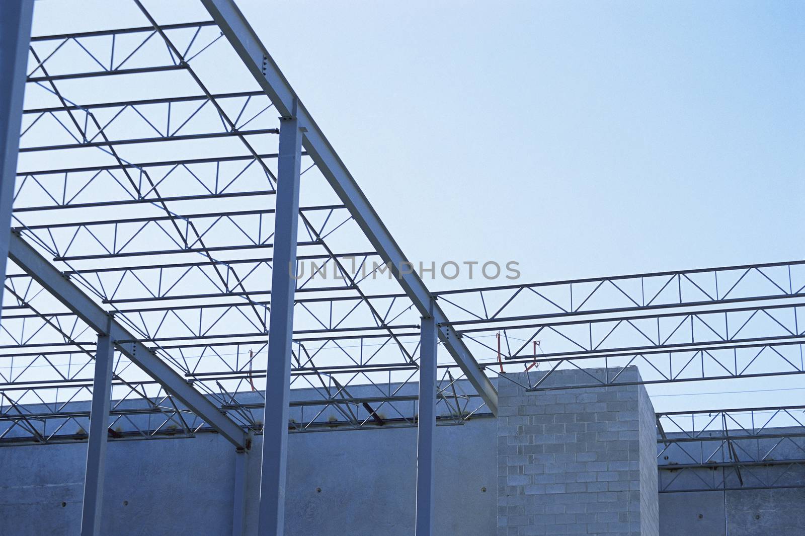 Construction site of concrete walls and metal beams