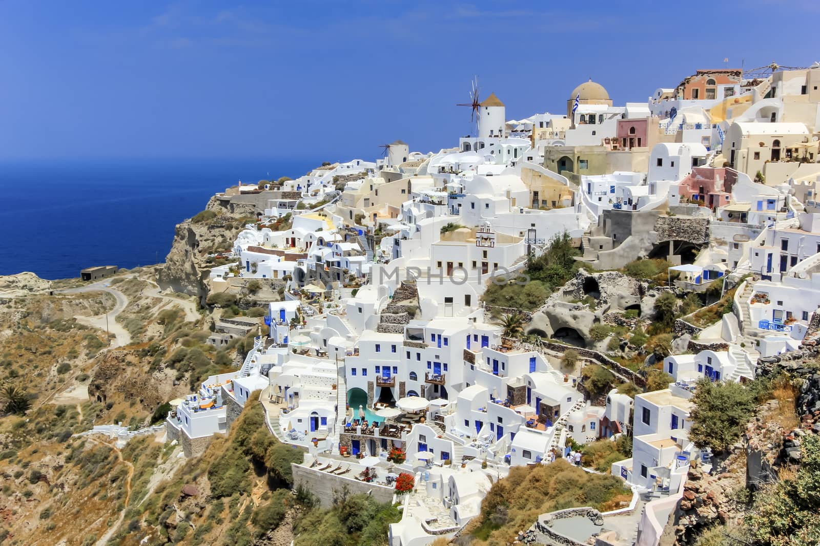 Oia village on Santorini island, north, Greece by Elenaphotos21