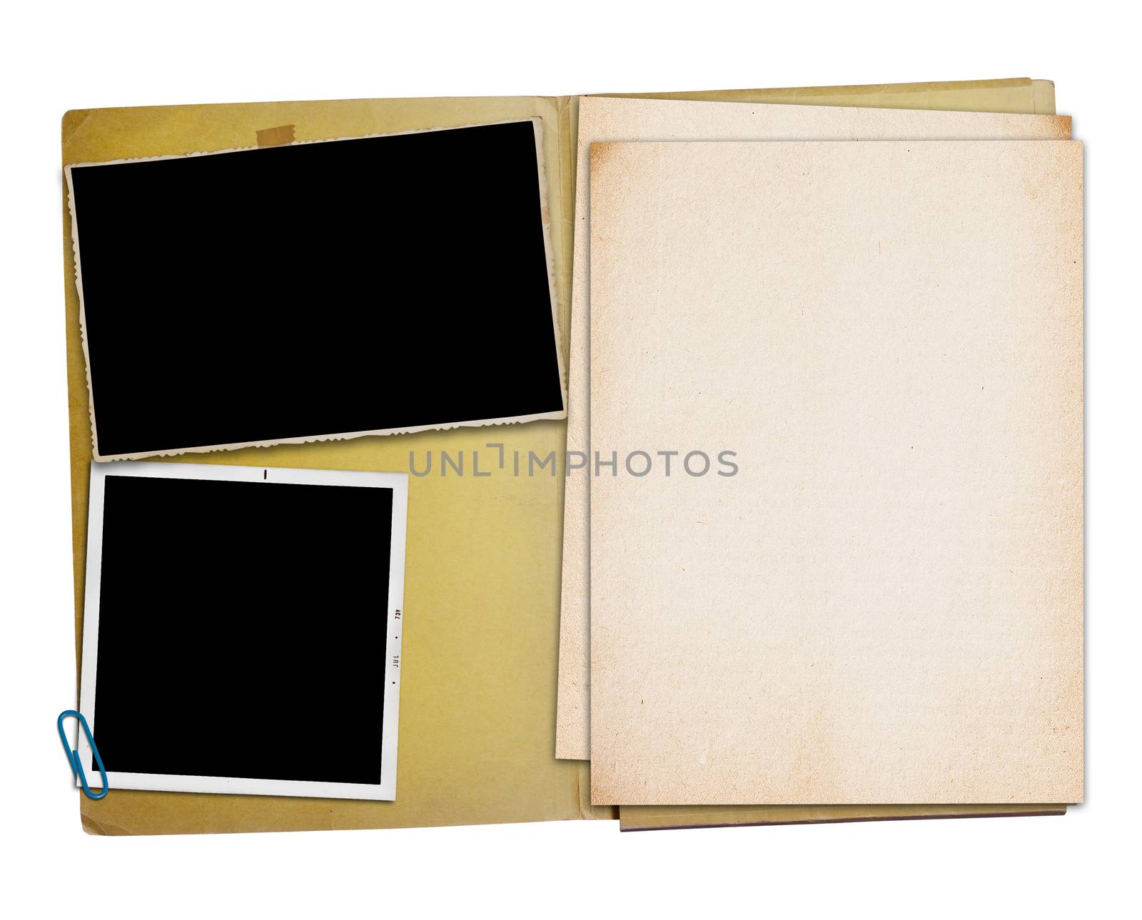Open vintage folder with two old photographs, by elnavegante