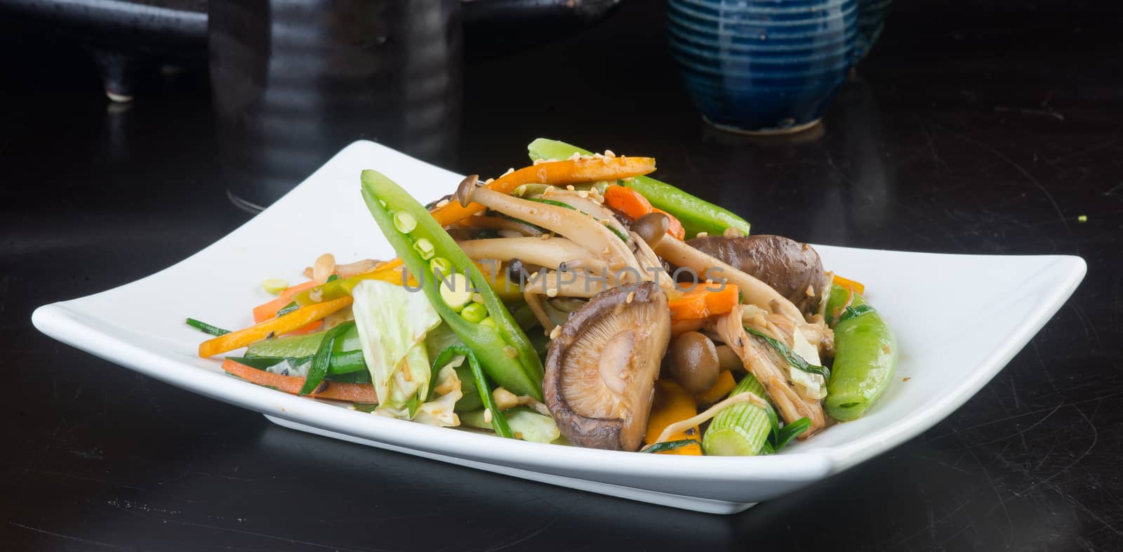 japanese cuisine. fried mix vegetables on the background by heinteh