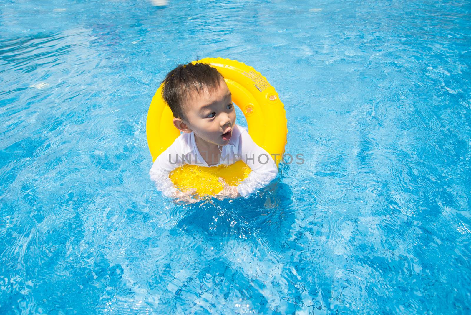 baby boy Activities on the pool, asian children swimming