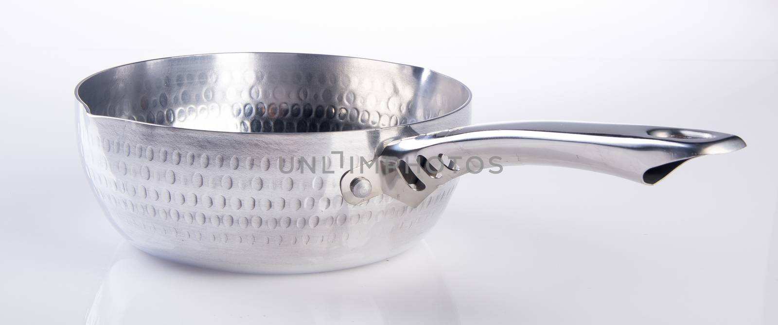 pans. aluminium pans on background. by heinteh