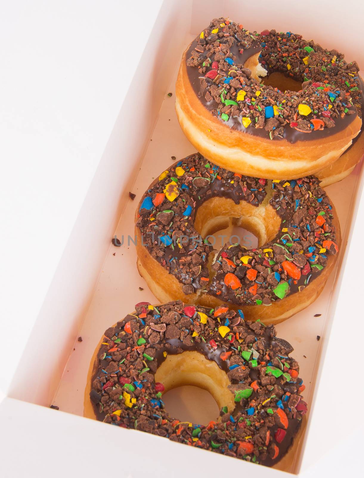 chocolate donuts on a white background by heinteh