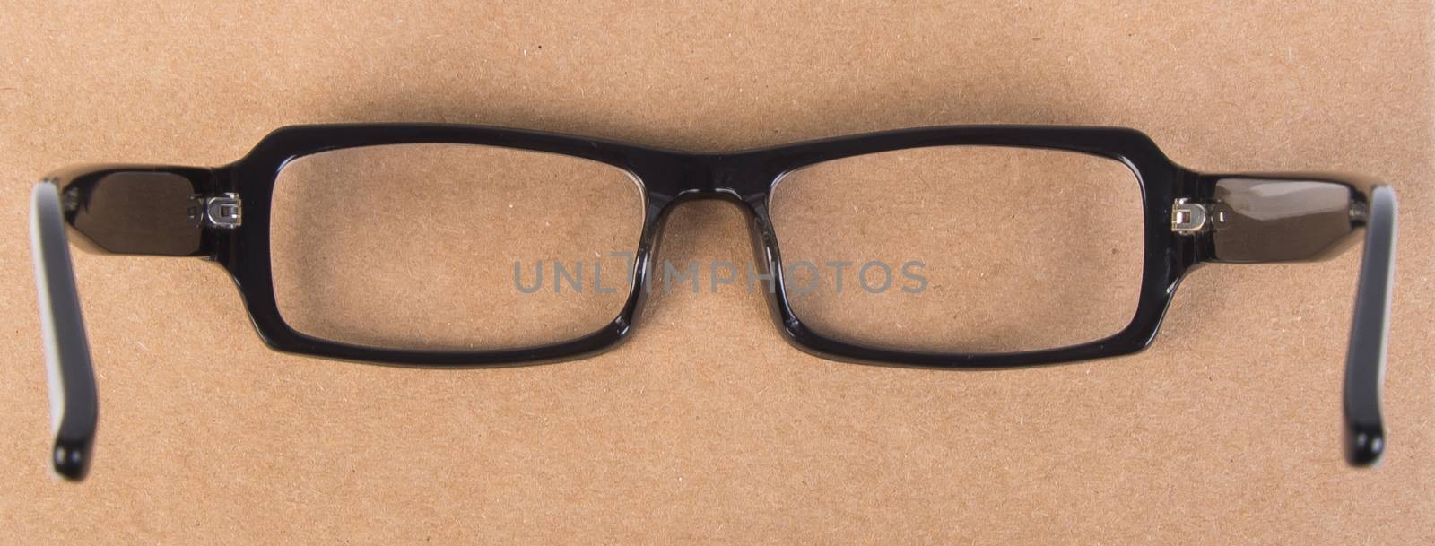eye glasses. eye glasses with book on background