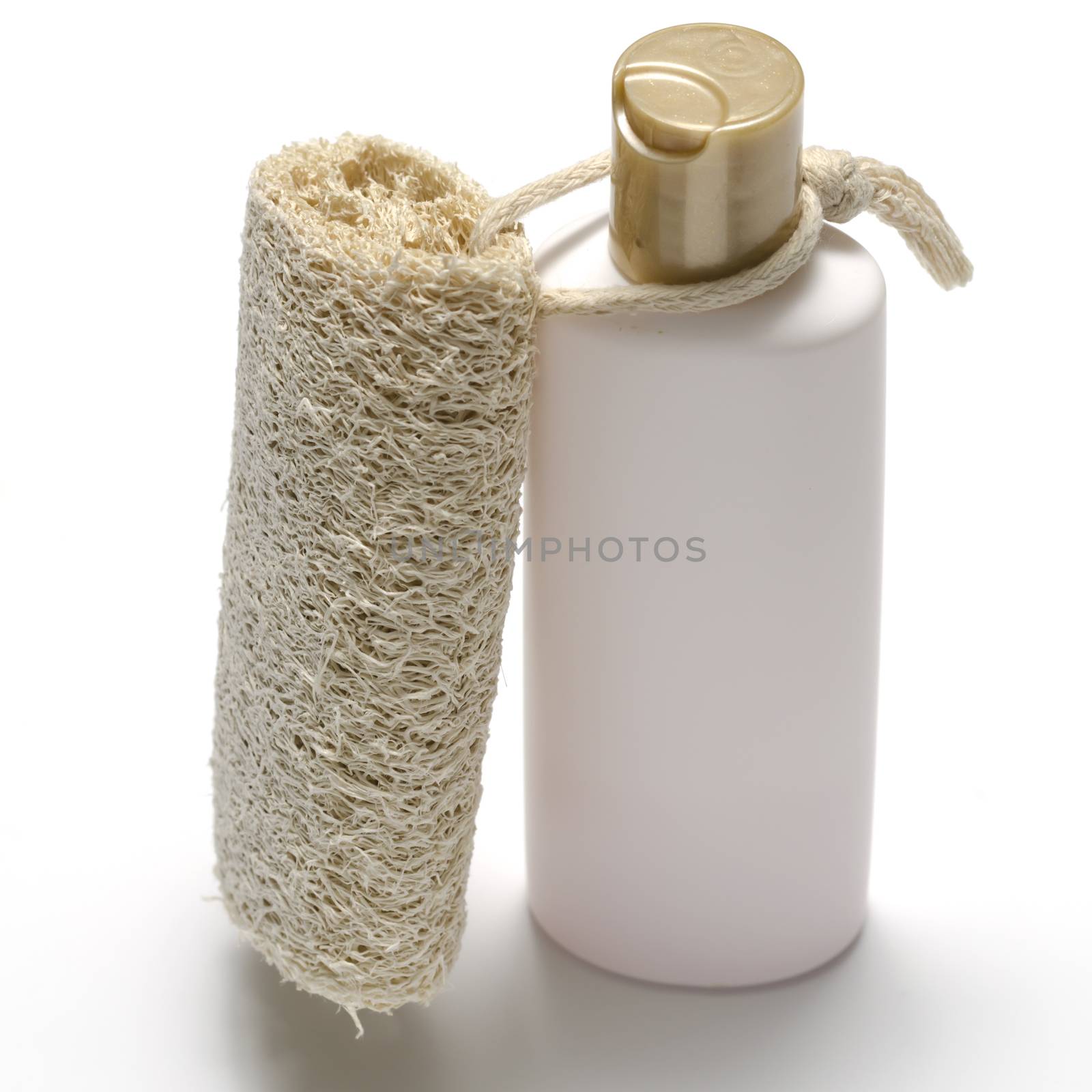 loofah and liquid soap isolated on a white background