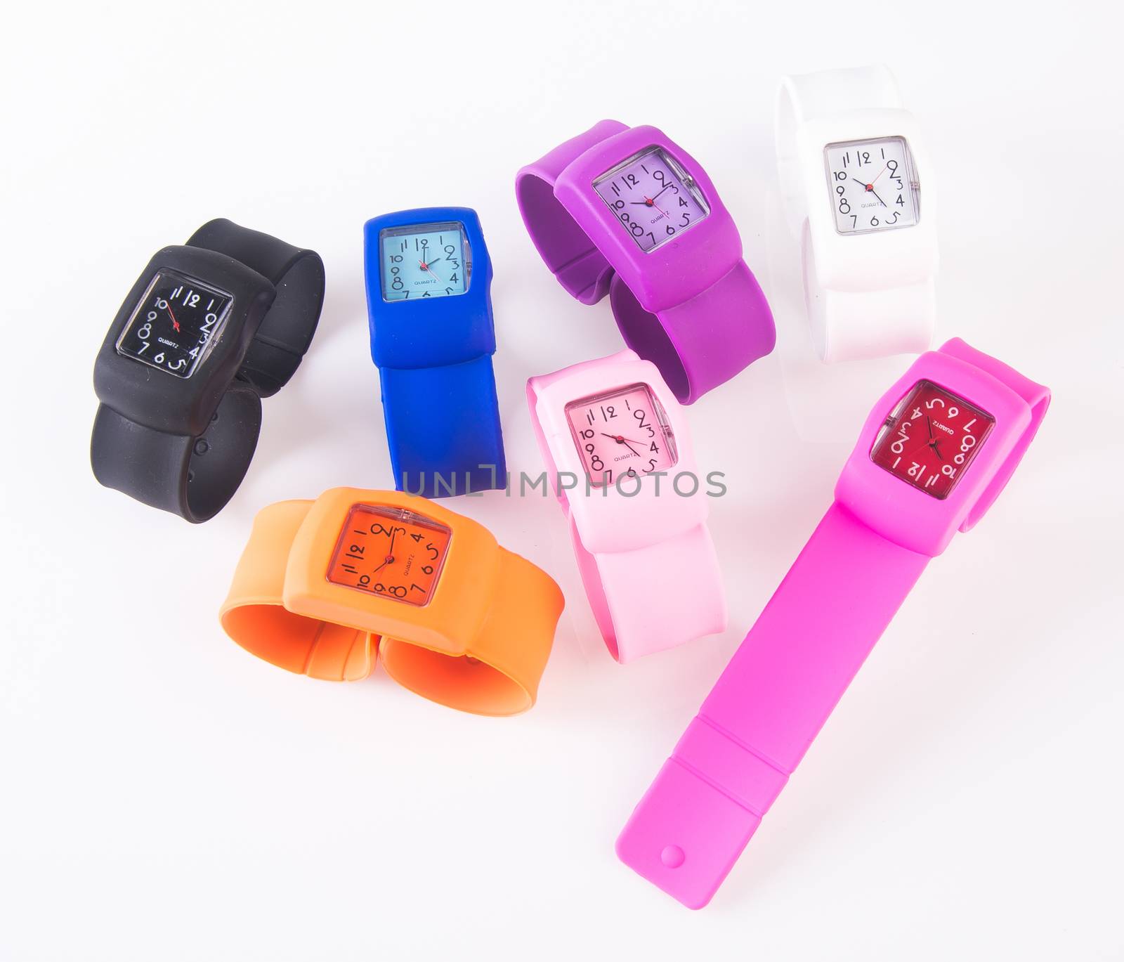 watches. colorful set of plastic watches isolated on white.