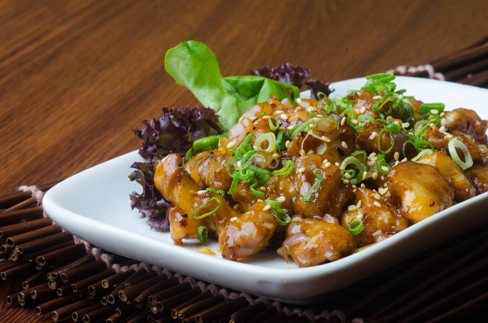 japanese cuisine. fry sauce chicken on the background by heinteh