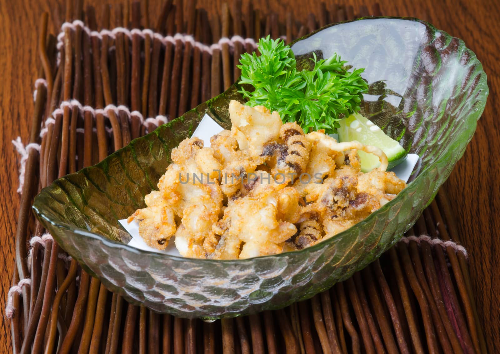 japanese cuisine. fried squid on background