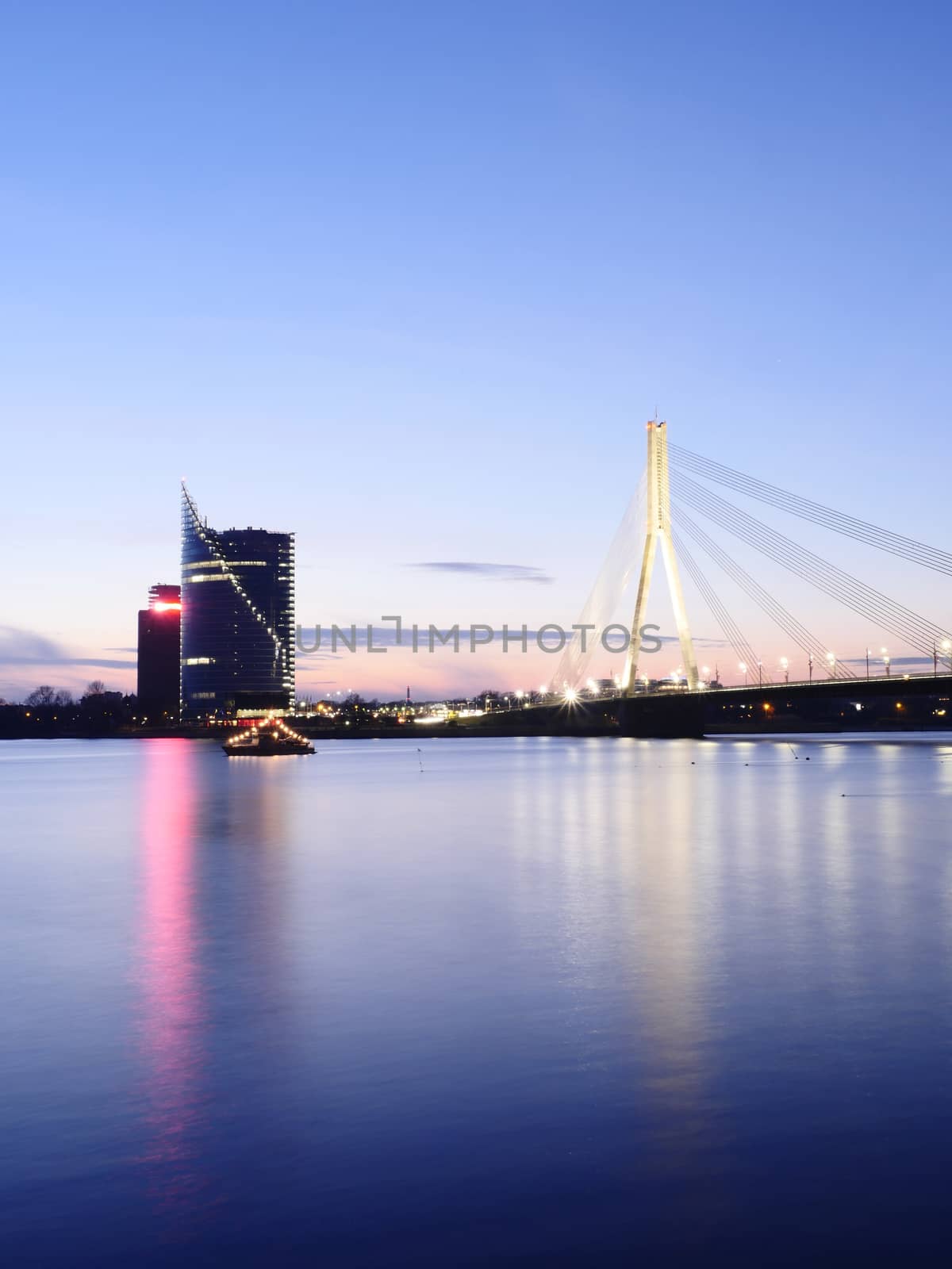 View of Riga river and Vansu Bridge in evening