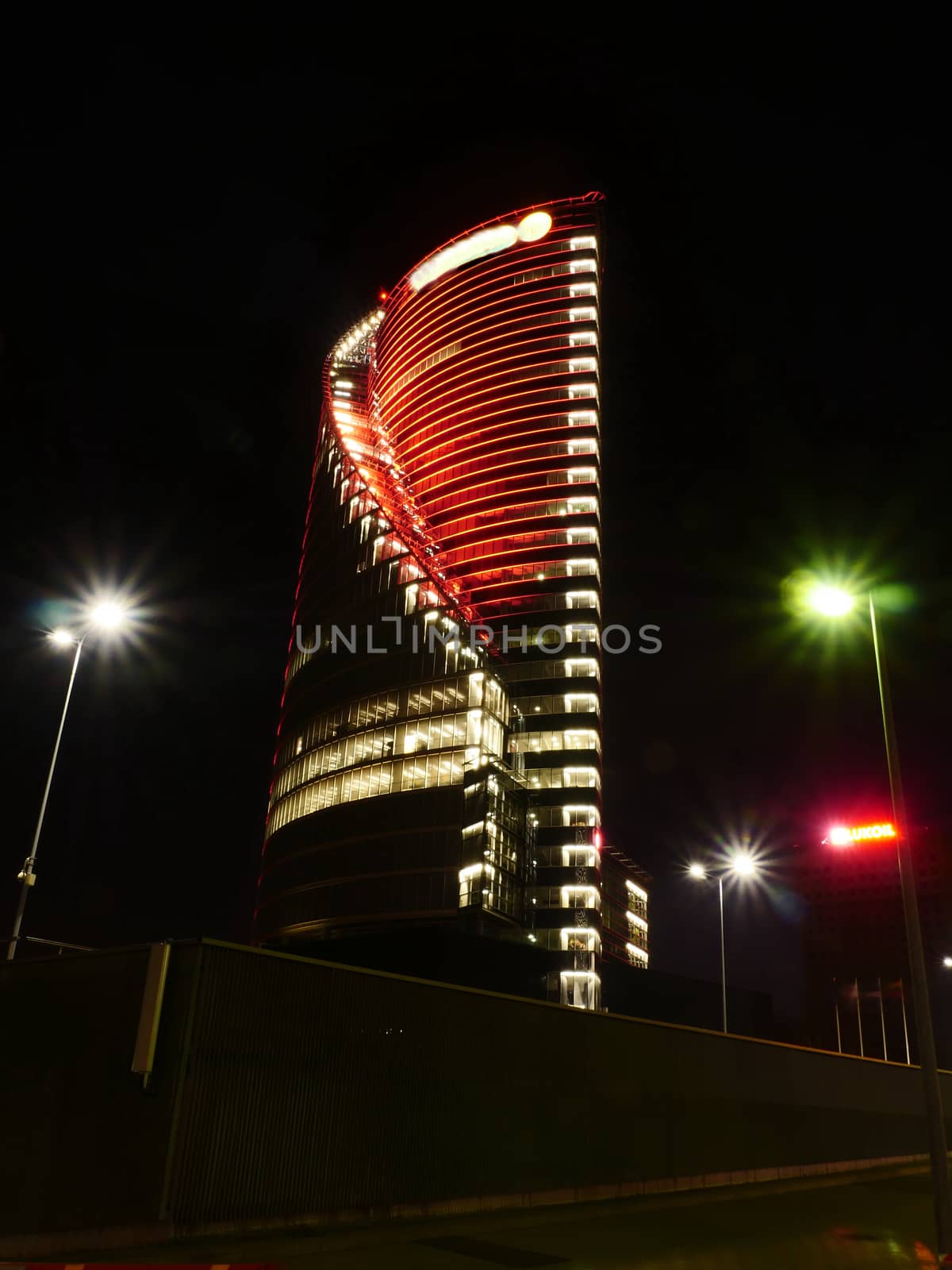 modern buildings in red colours at night