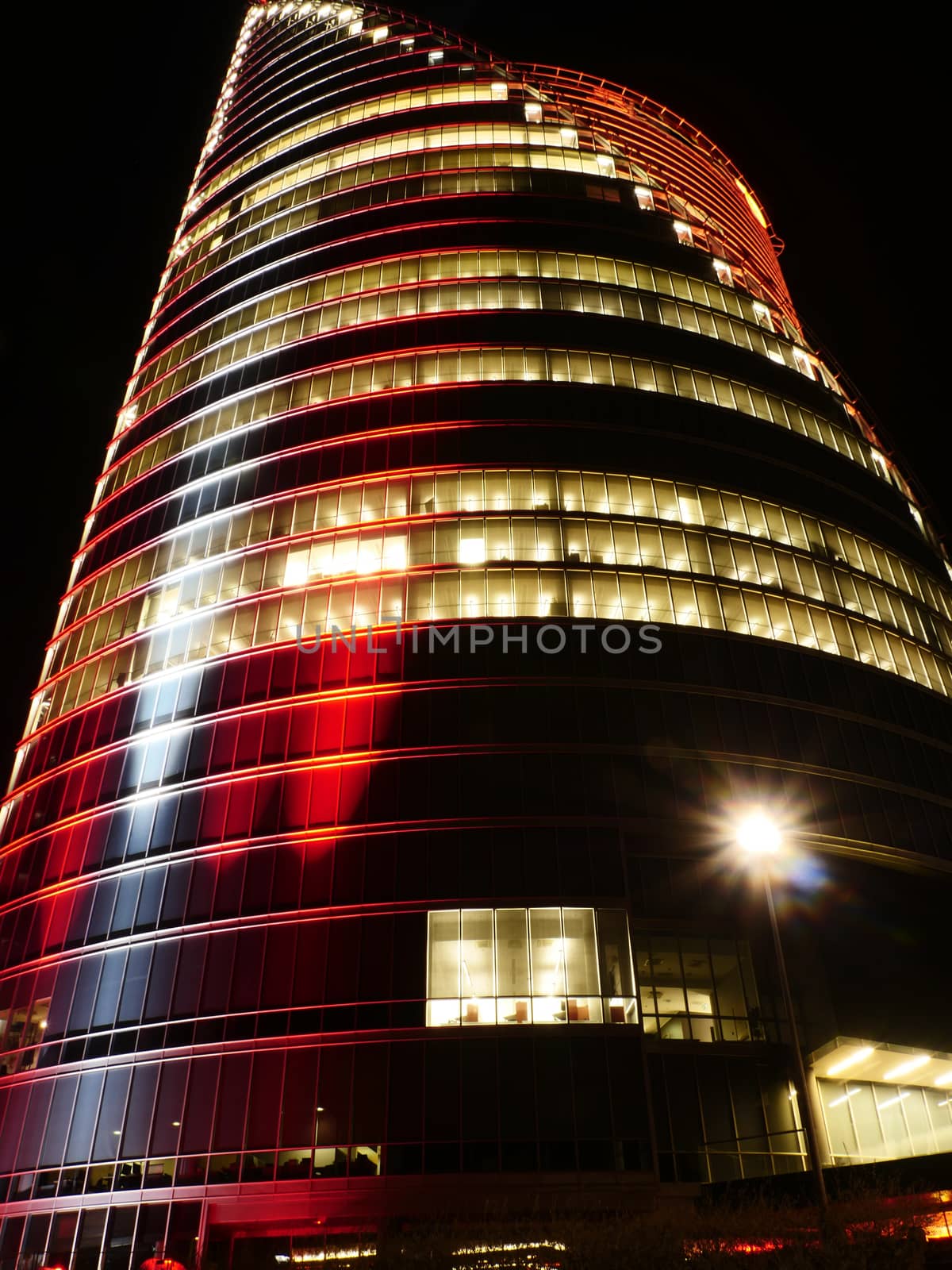 modern buildings in red colours at night