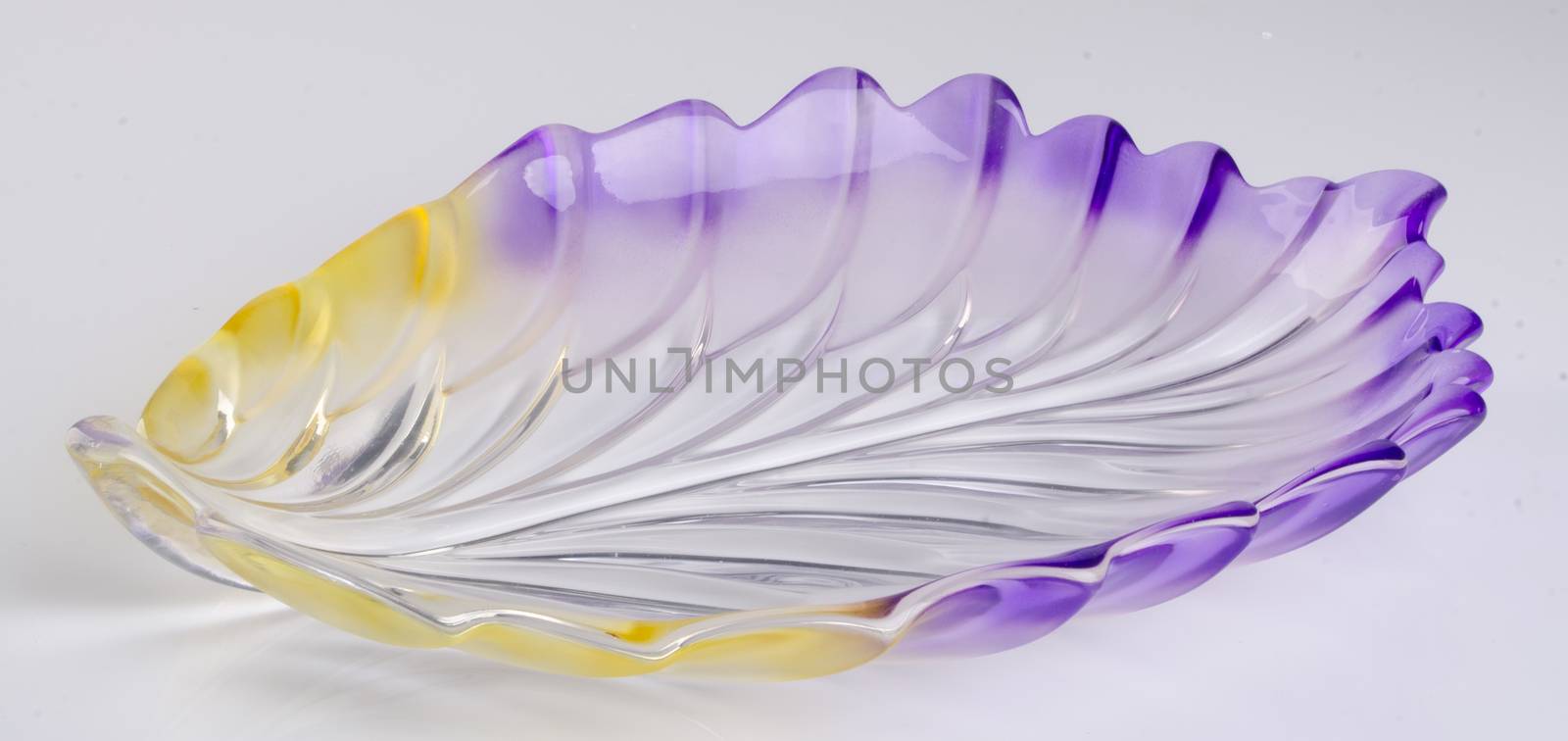 crystal glass bowl on a background. by heinteh