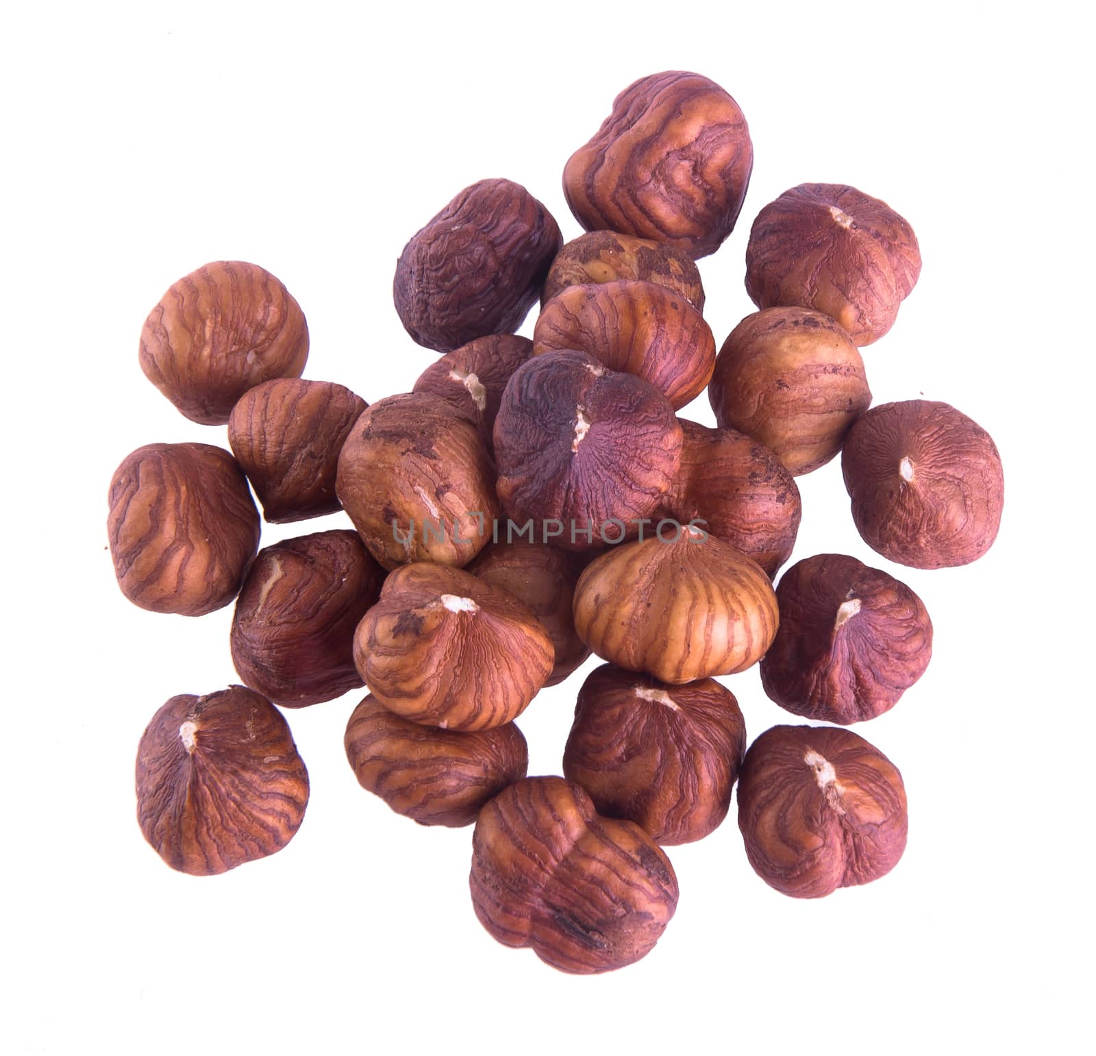 hazelnuts. hazelnuts on the background by heinteh