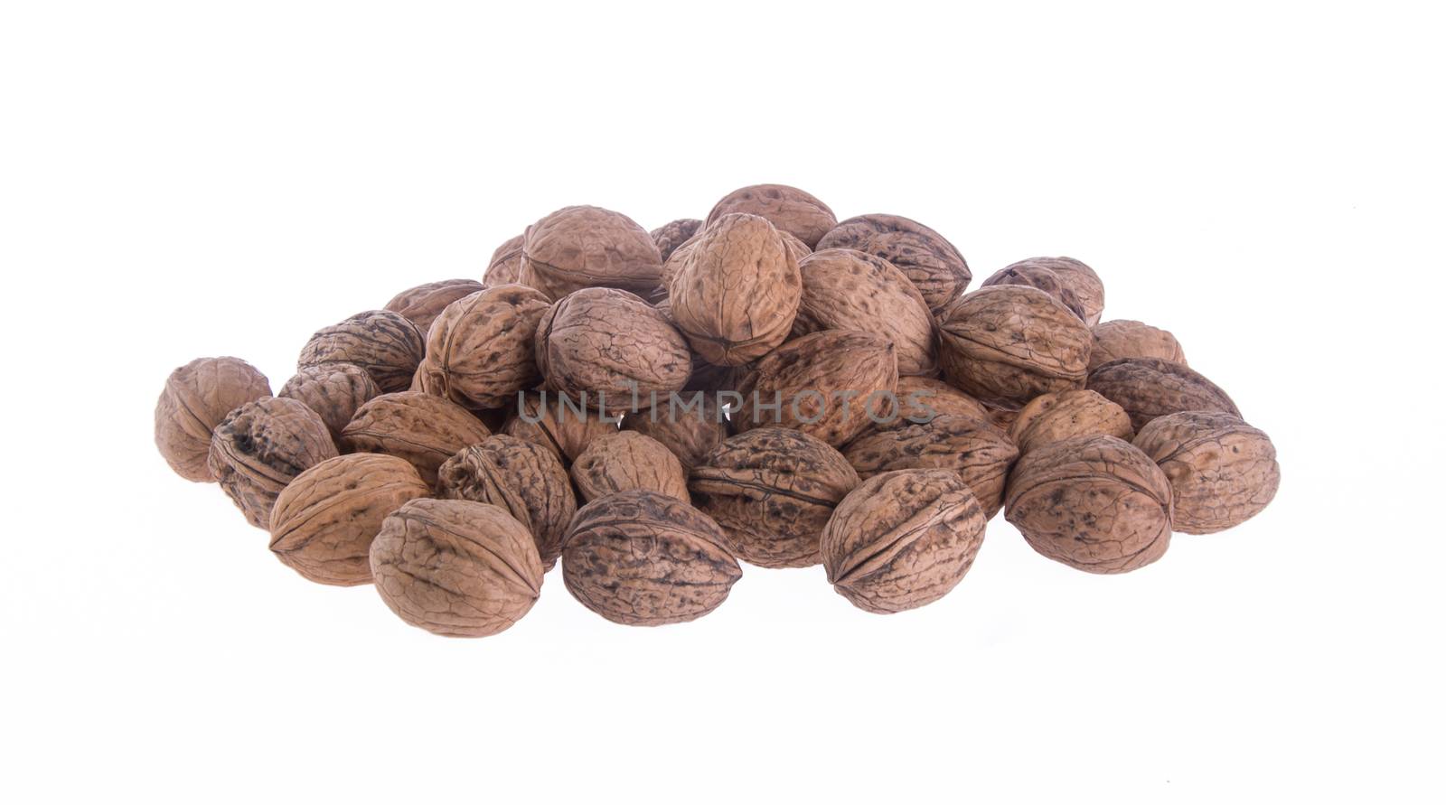 nut. walnut on the background.