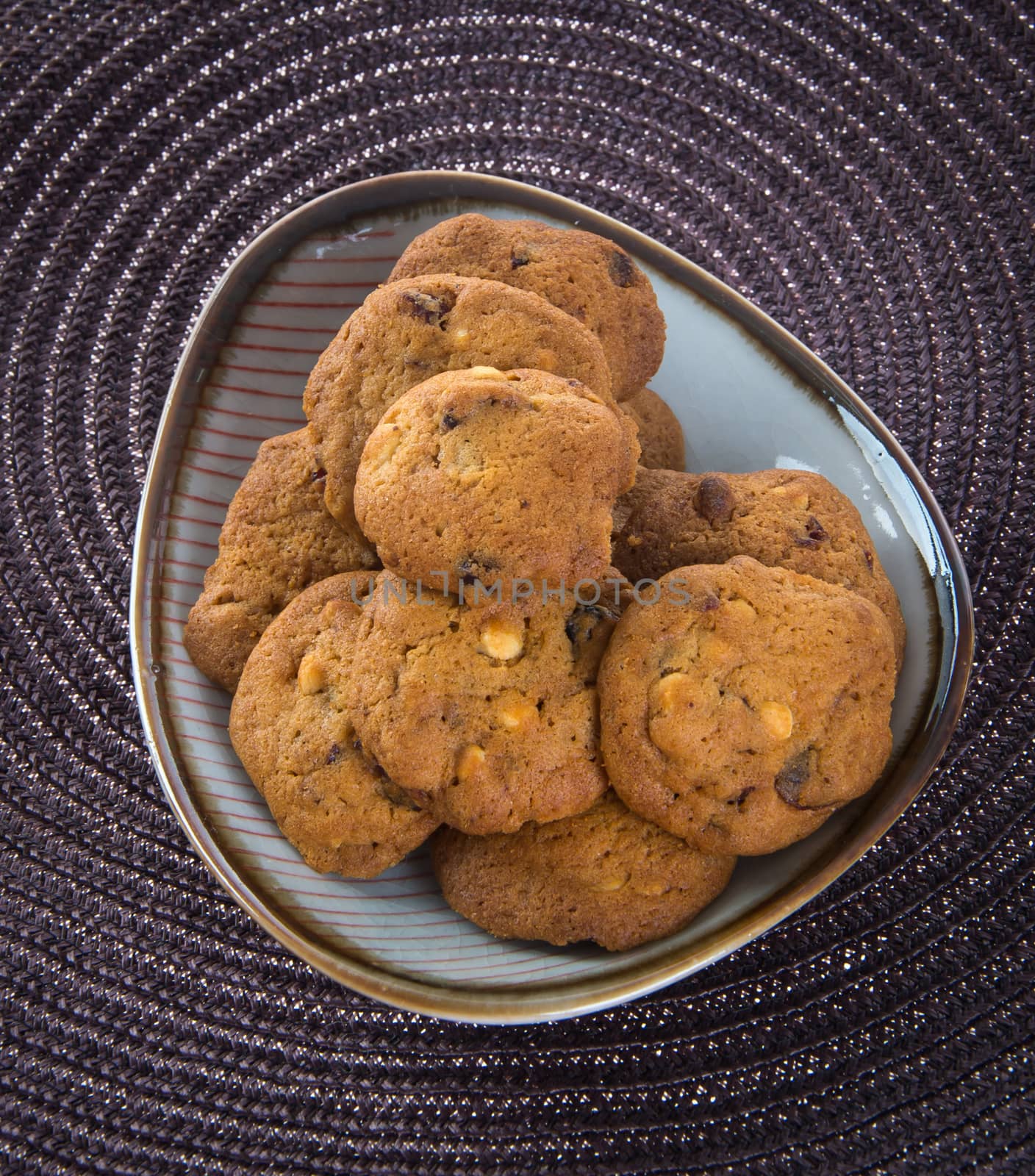 Chocolate chips cookies on background by heinteh