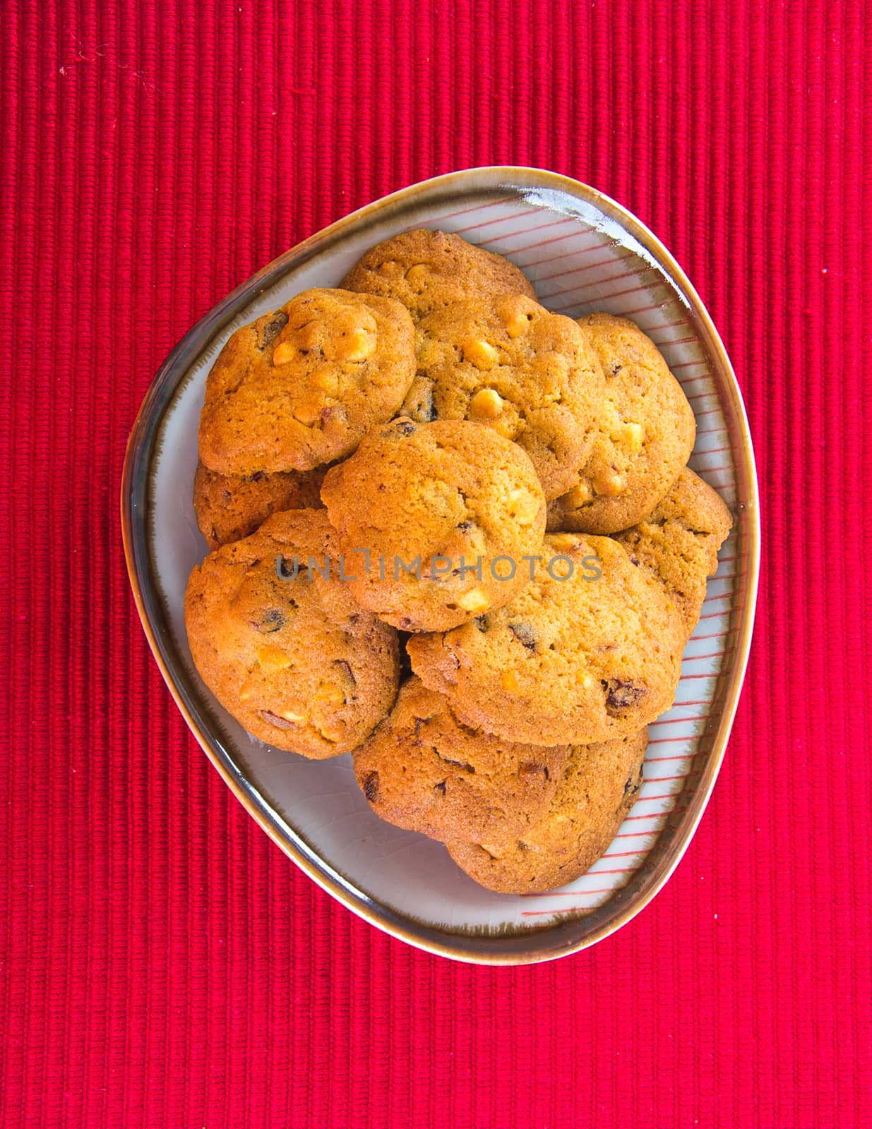 Chocolate chips cookies on background by heinteh