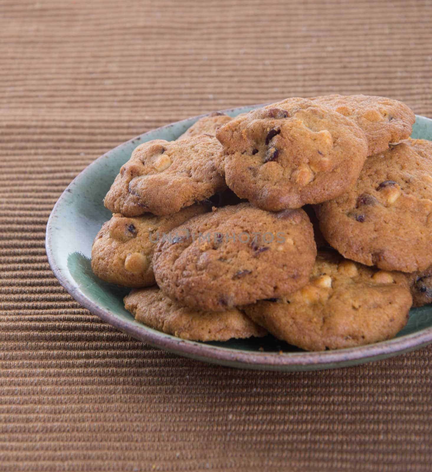 Chocolate chips cookies on background by heinteh