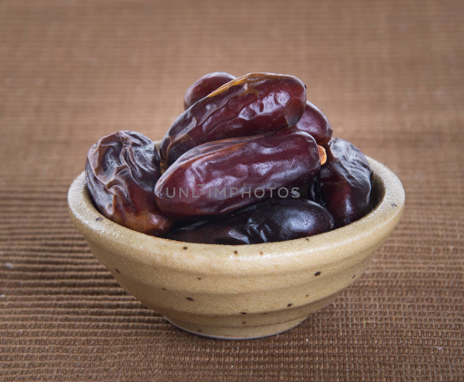 Dates, Dried dates on a background by heinteh