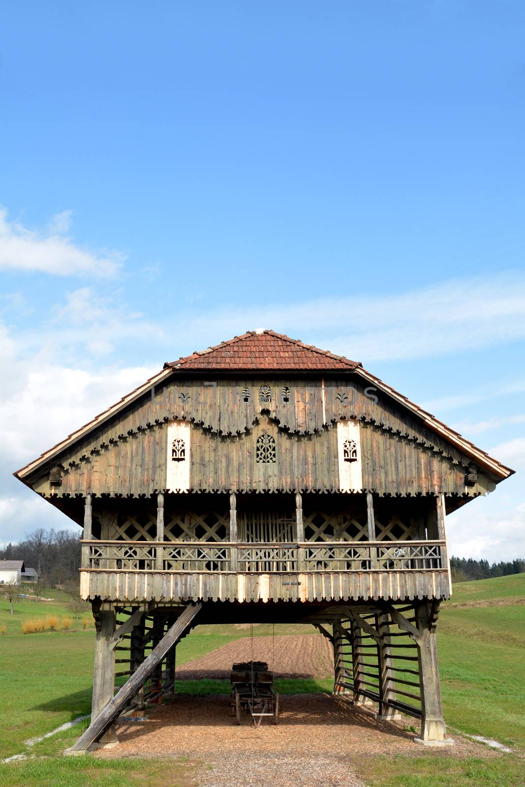 Traditional Slovenian structure, used for storing farming tools, drying corn, and so on