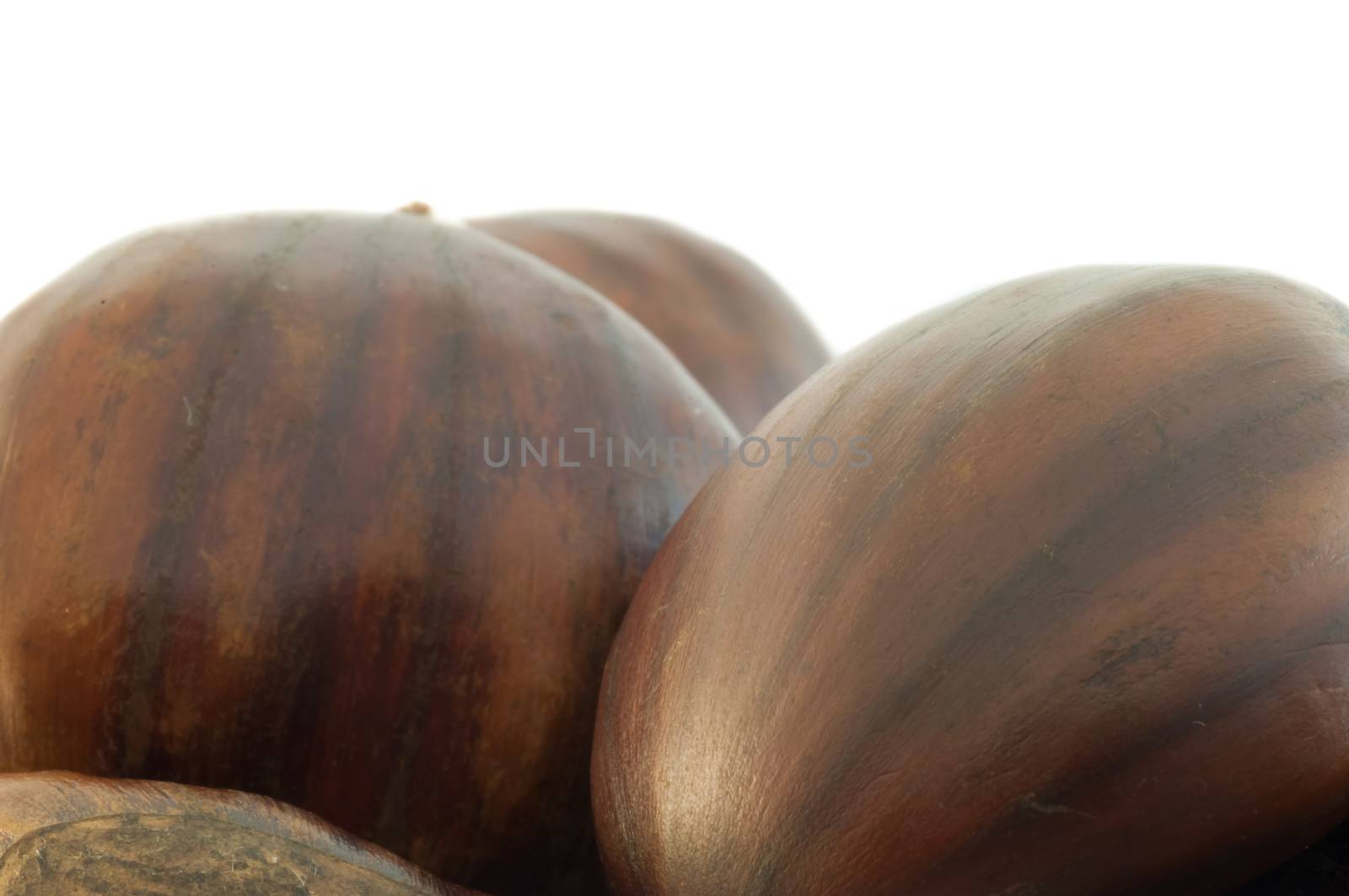 raw natural macro of cooked chestnuts in studio