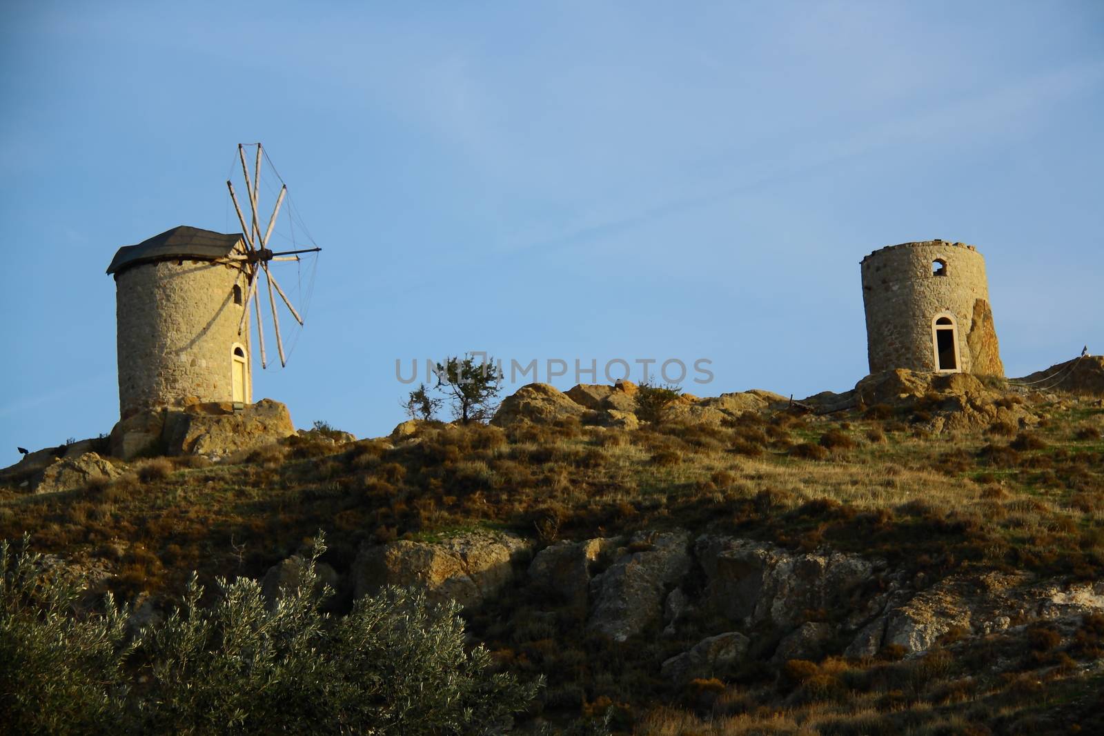 windmills with bright sky in Foca 
