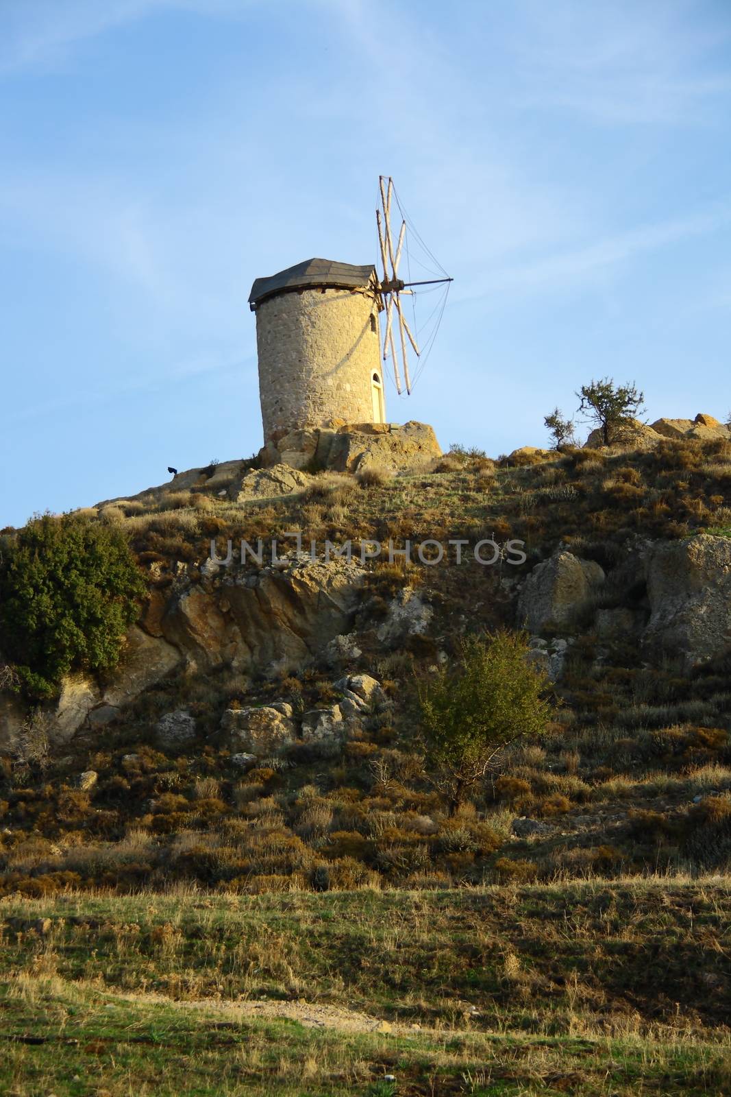 windmills with bright sky in Foca 
