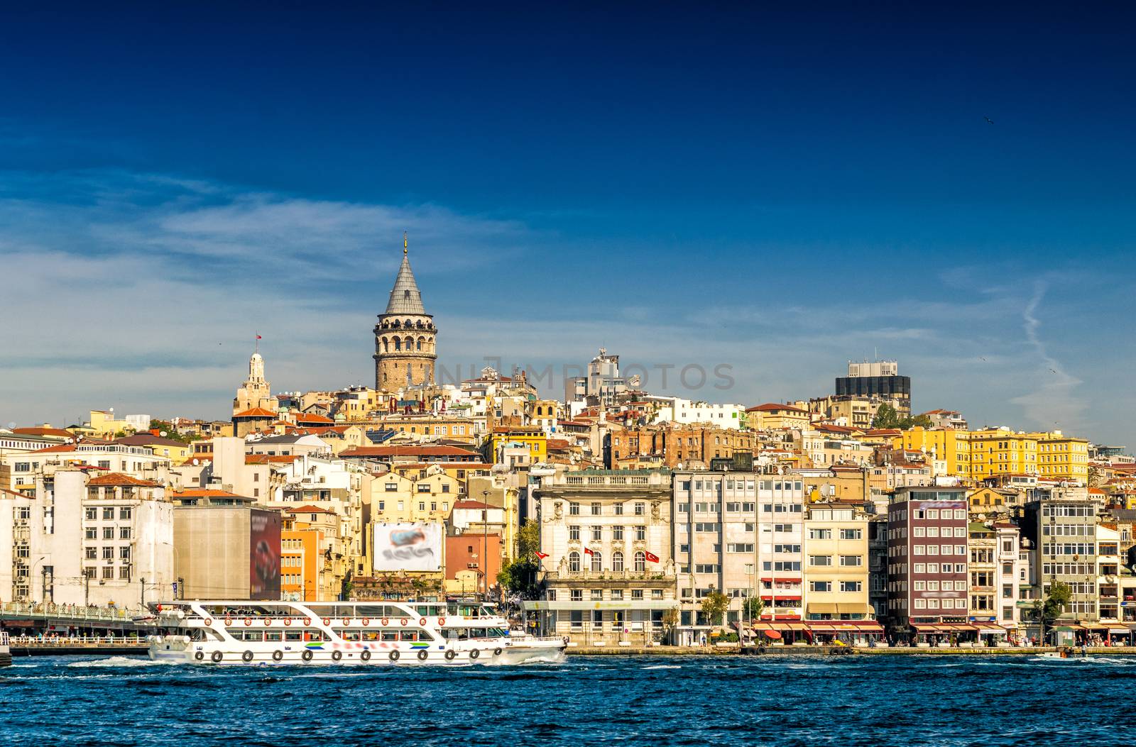 Beautiful view of Beyoglu with Galata Tower on a sunny day - Istanbul, Turkey.