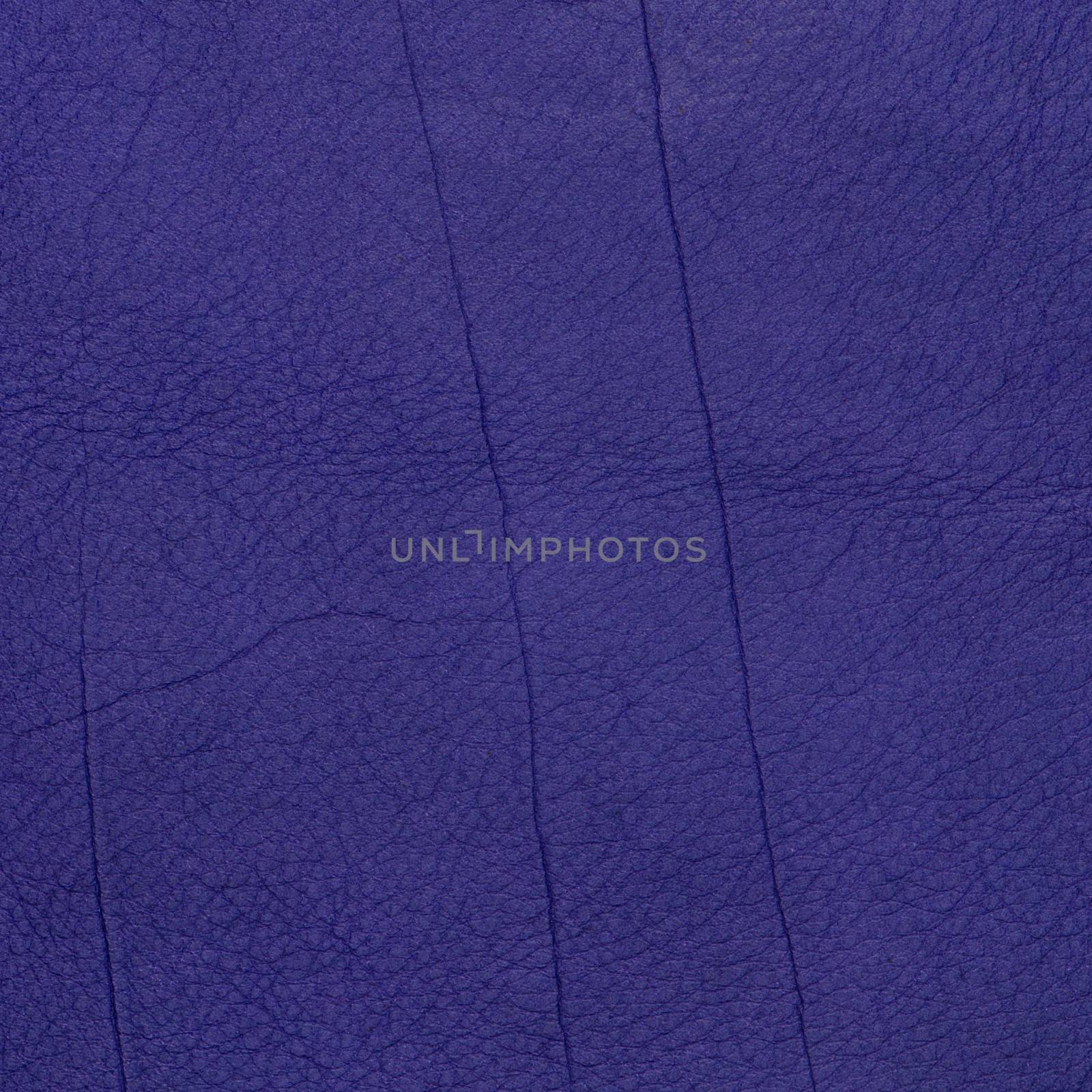 Closeup detail of violet leather texture to background