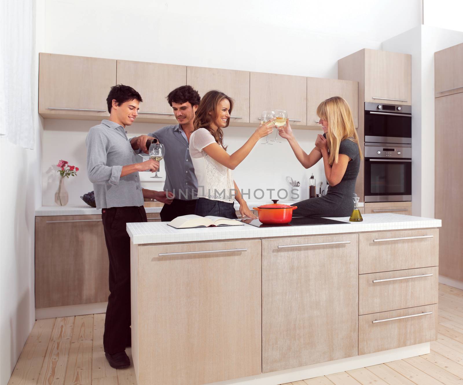 four friends preparing dinner by toocan