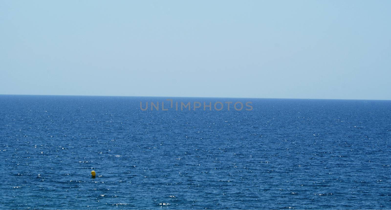 Only sea and sky, different kinds of blue color