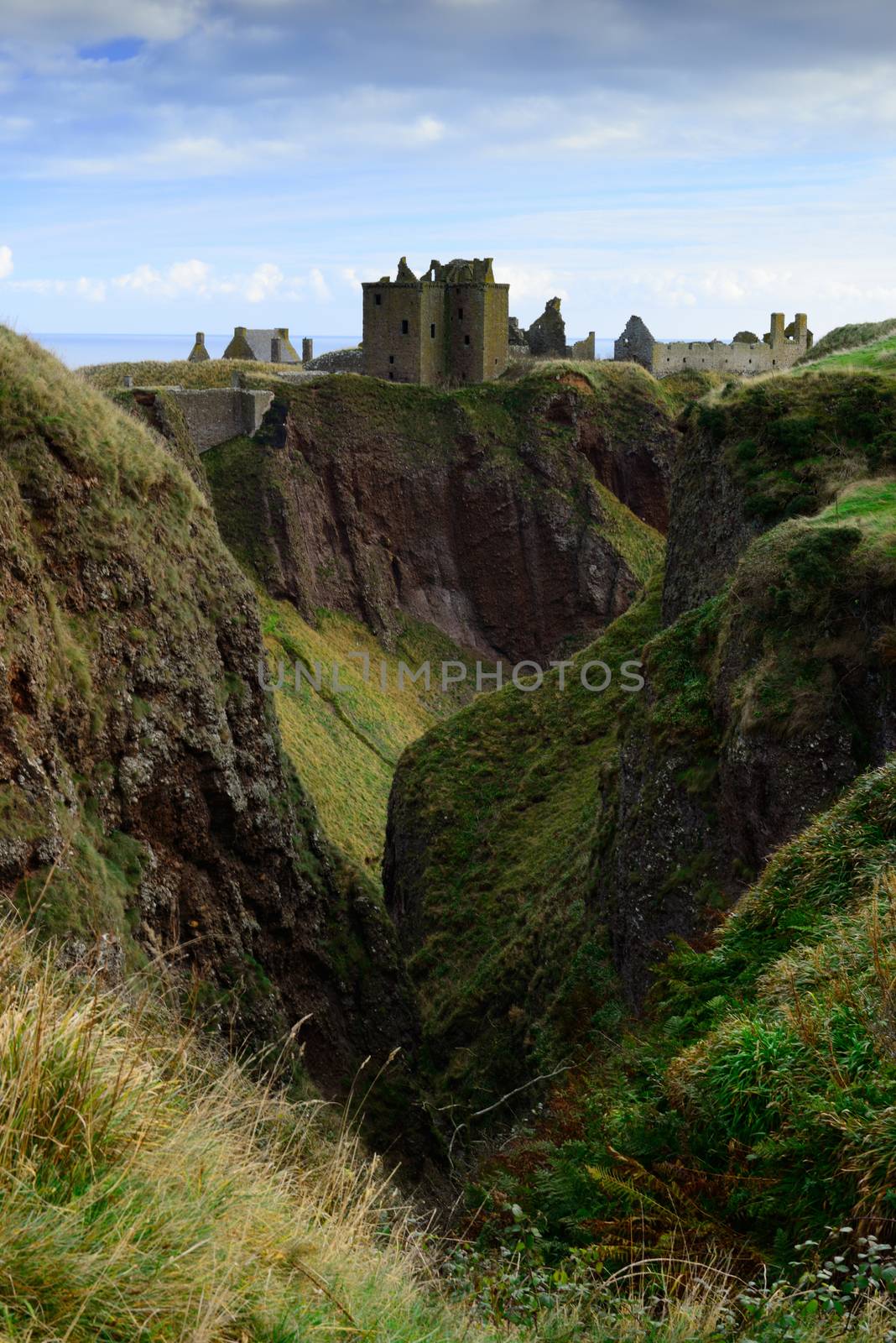 Dunnottar Castle with blue sky background in Aberdeen, Scotland