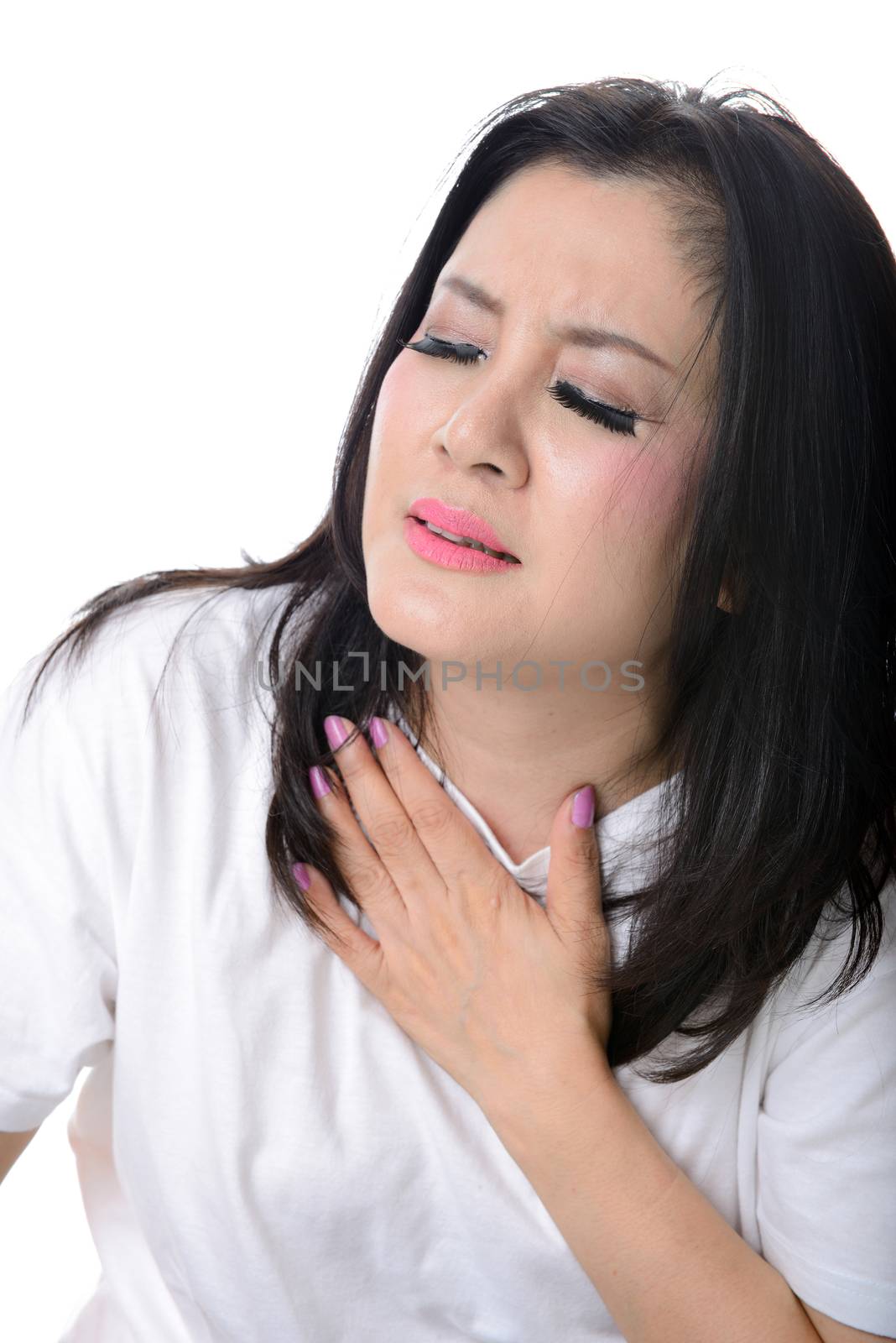 Close up of woman who has chest pain, isolated on white