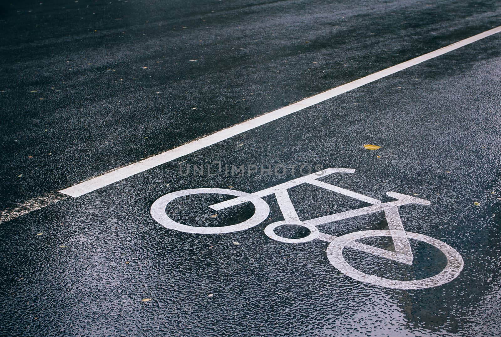Bicycle sign on the road after the rain,Beijing