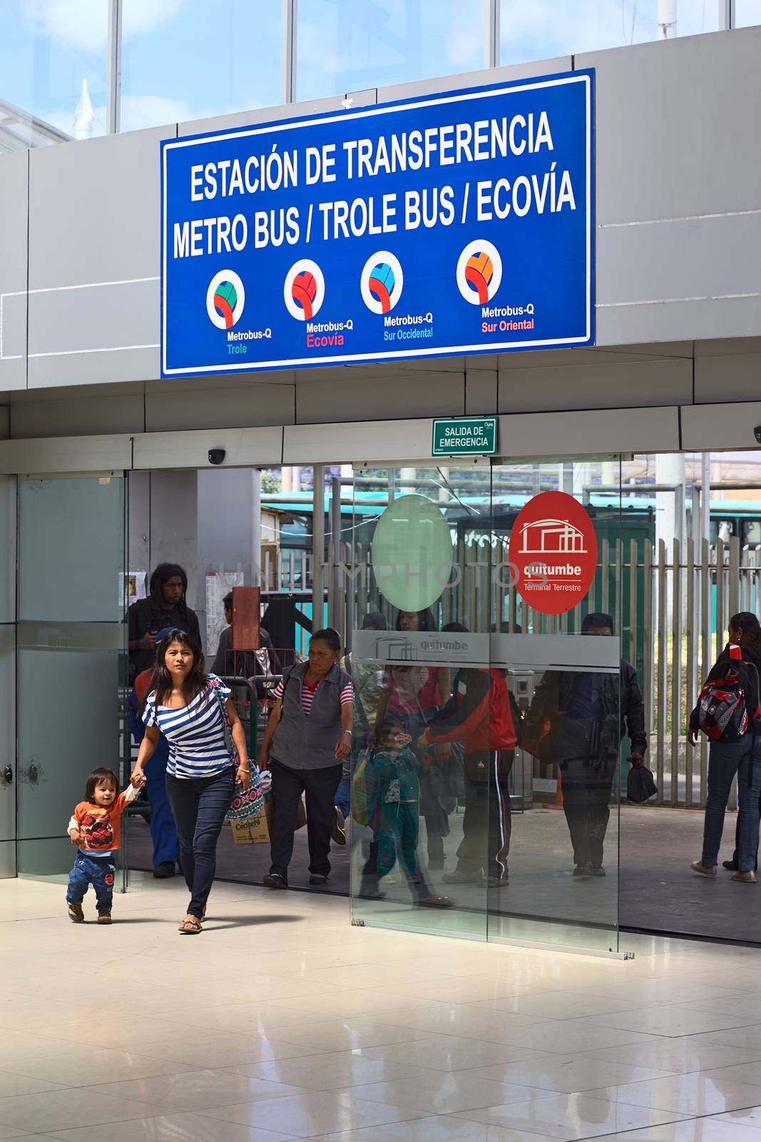 QUITO, ECUADOR - AUGUST 8, 2014: Unidentified people entering the Terminal Terrestre Quitumbe (terminal for long-distance buses) coming from the local buses on August 8, 2014 in Quito, Ecuador

