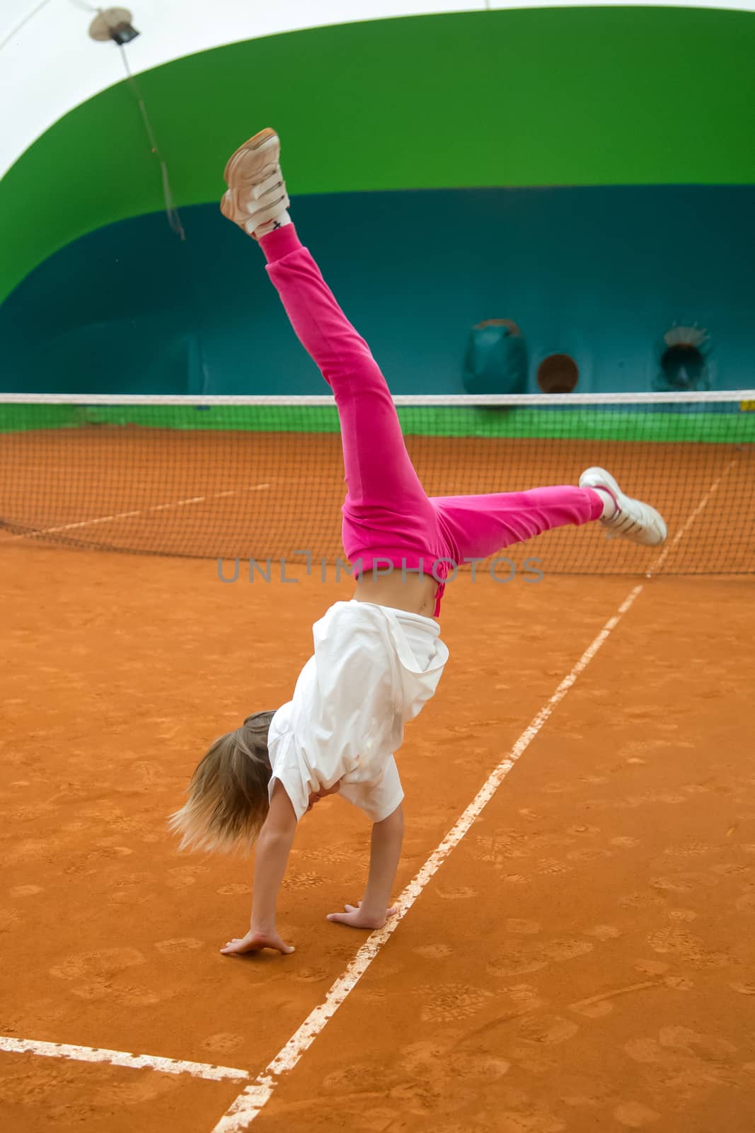 athletic exercise on the tennis court