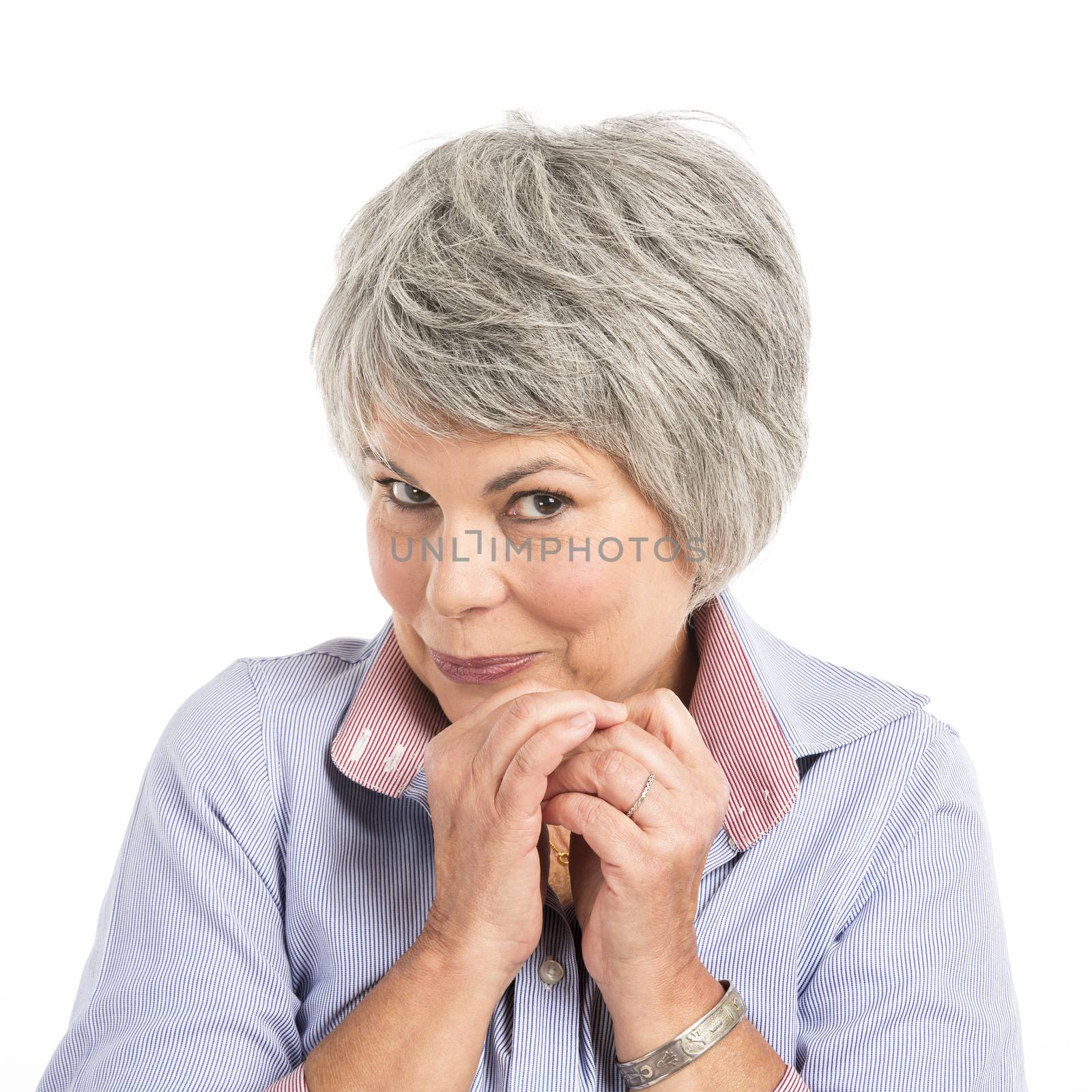 Portrait of a elderly woman with a shy expression