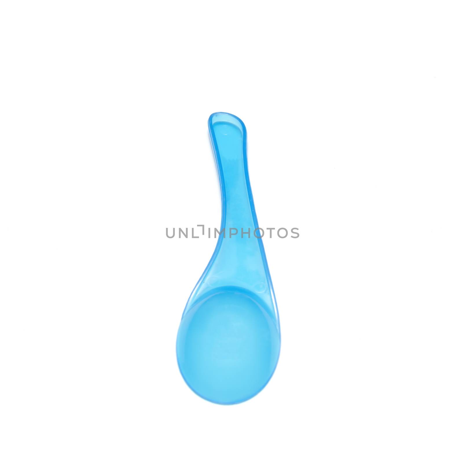 blue plastic spoon on a white background