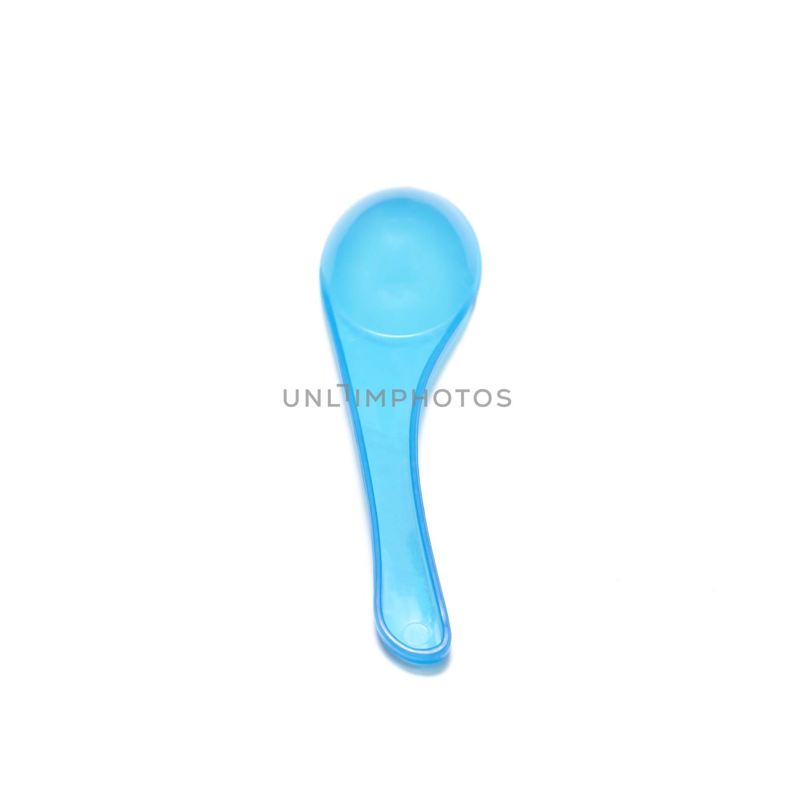 blue plastic spoon on a white background