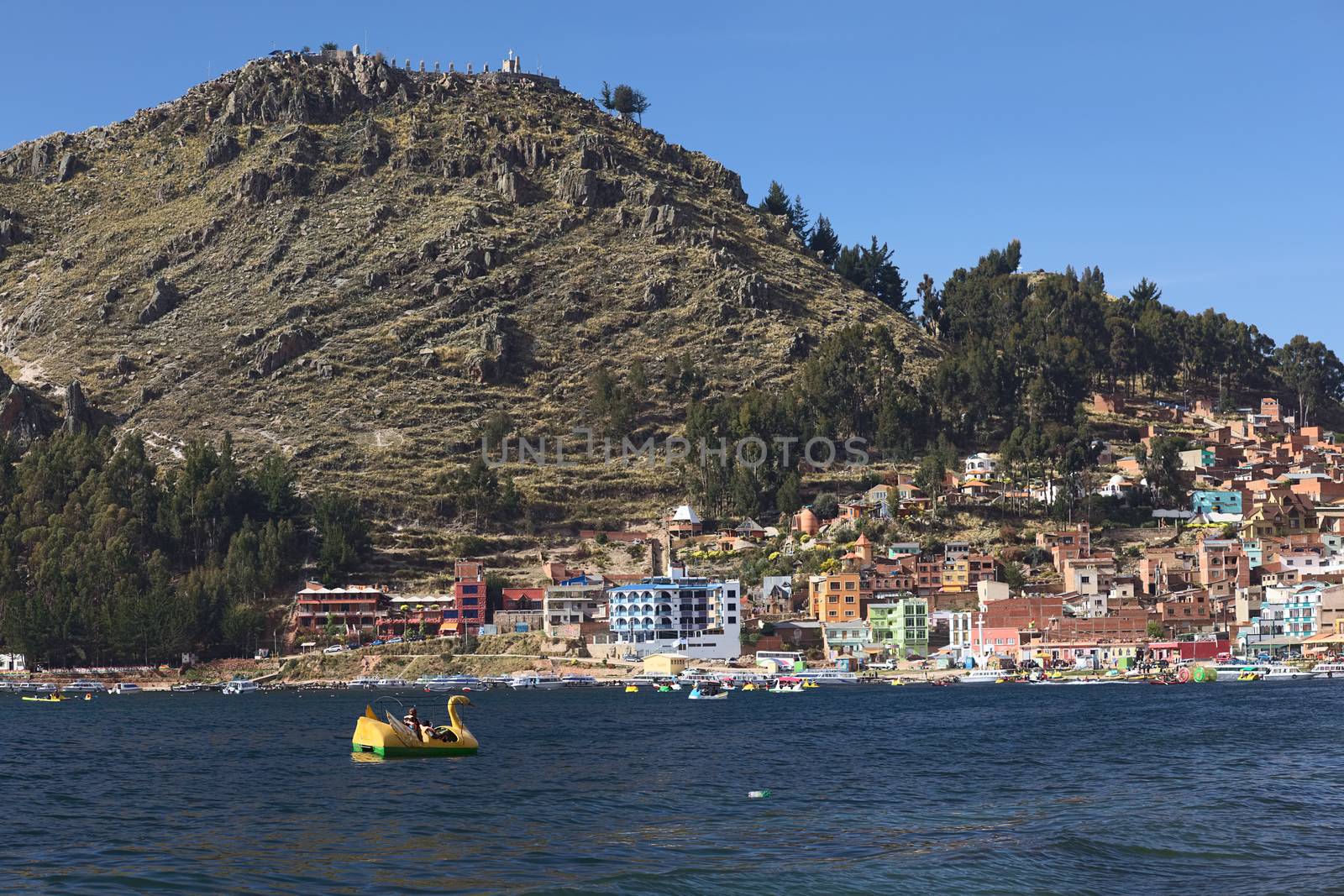 COPACABANA, BOLIVIA - OCTOBER 18, 2014: The shoreline of the small town of Copacabana along Lake Titicaca on October 18, 2014 in Copacabana, Bolivia. Copacabana is a popular tourist destination and starting point for tours to Isla del Sol (Island of the Sun).