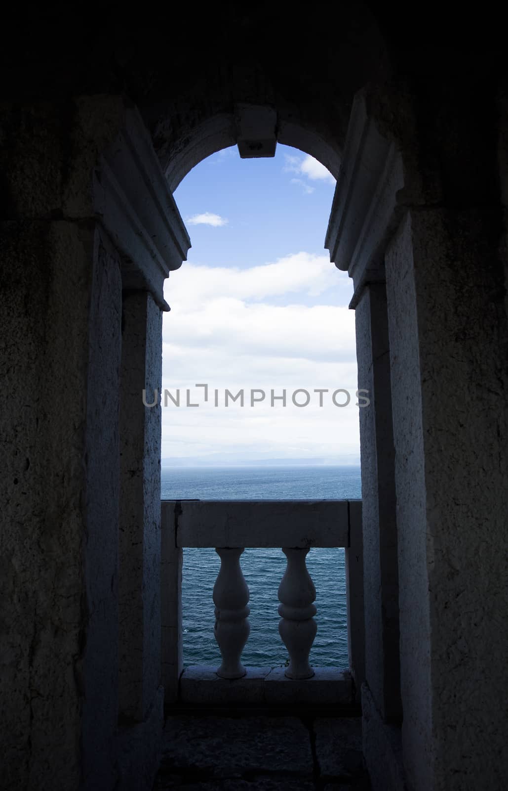 View of an ocean scene through archway